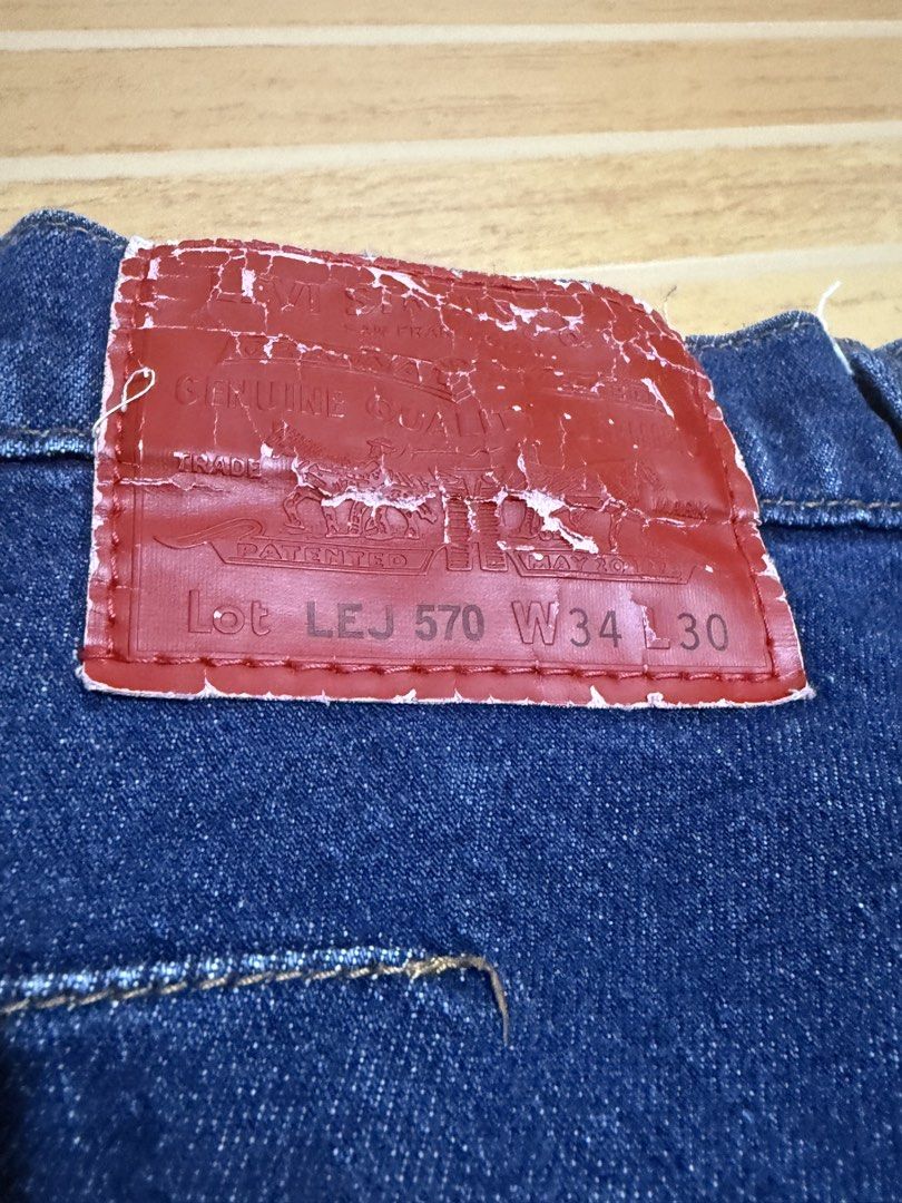 Levi's Engineered Jeans LEJ 570 W34 L30 (Category: Jeans) located in Mandaluyong City. Submitted by kickin_it_thrift (Listing ID 1465933523, Image 2). Description: - Brand/Model: Levi's Engineered Jeans (LEJ 570) - Size: W34 L30 - Color: Clean dark indigo wash with contrast stitching - Design: Unique curved seam construction for ergonomic fit - Details: Signature red back patch, branded interior waistband tags, and engineered tape inside - Condit