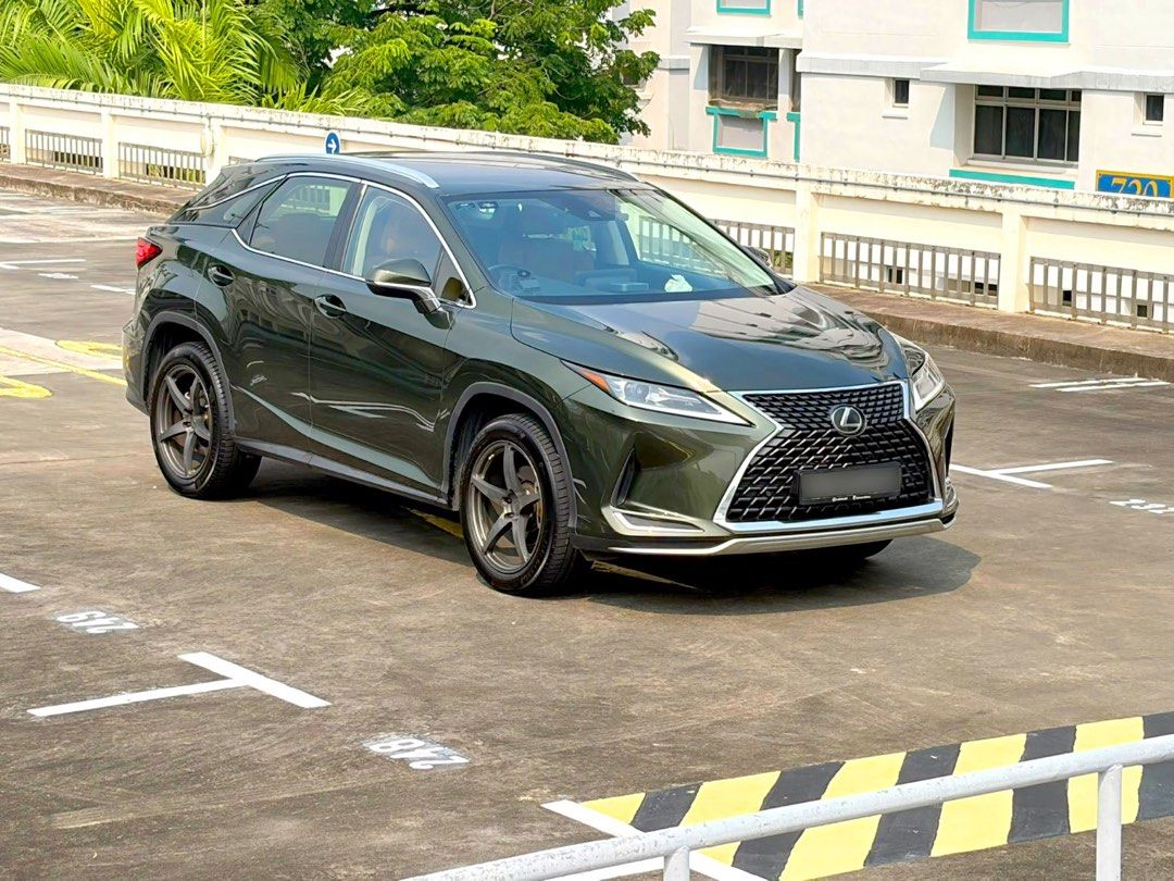 Lexus RX300 2.0 Executive Auto (Category: Used Cars) located in Singapore. Submitted by vvass (Listing ID 1465874357, Image 1). Description: **Rare Colour Combination! Dark Green Exterior With Brown Interior!** 2020 Lexus RX300 Executive in a beautiful and uncommon dark green exterior paired with premium brown interior. A classy and understated colour combination that is rarely seen on the road. Well-maintained and currently clocking **115,000km*