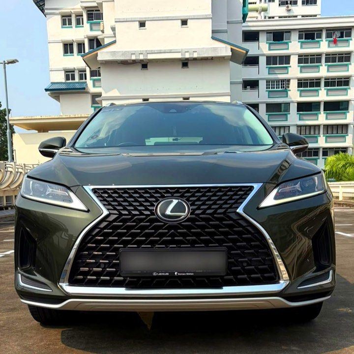Lexus RX300 2.0 Executive Auto (Category: Used Cars) located in Singapore. Submitted by vvass (Listing ID 1465874357, Image 2). Description: **Rare Colour Combination! Dark Green Exterior With Brown Interior!** 2020 Lexus RX300 Executive in a beautiful and uncommon dark green exterior paired with premium brown interior. A classy and understated colour combination that is rarely seen on the road. Well-maintained and currently clocking **115,000km*
