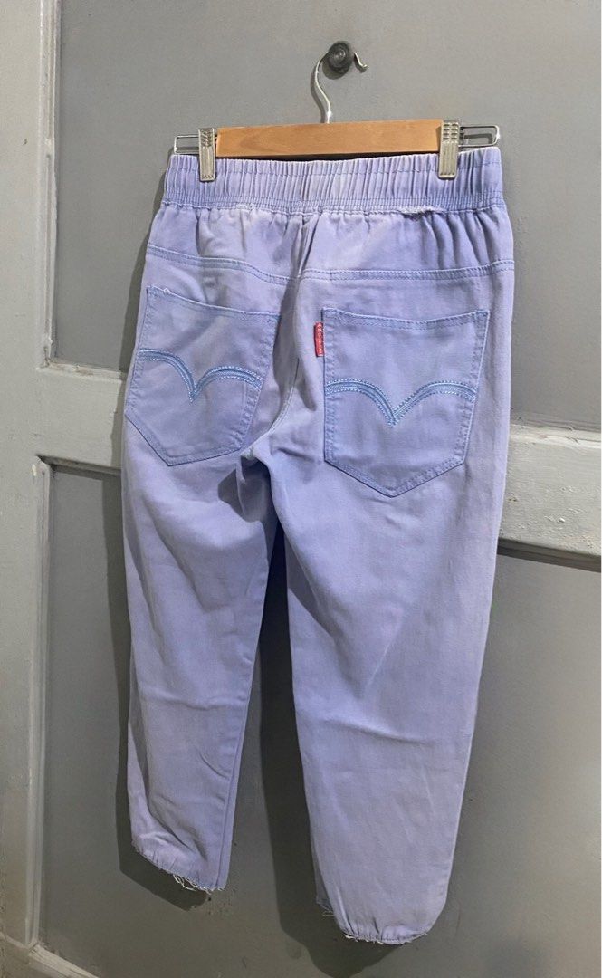 Light blue Jogger Jeans (Category: Jeans) located in Manila. Submitted by mturla4011142 (Listing ID 1465891081, Image 2). Description: Details: Color: light blue denim Front: Garter waist with long blue drawstring, side pockets, frayed / raw hem at the ankle (punit-punit sa dulo, that’s the style) Back: Two back pockets with Levi’s-style arcuate stitch (yung V-shaped tahi), and red tab on the right pocket Cut: Baggy jogger / mom jeans fit, straig