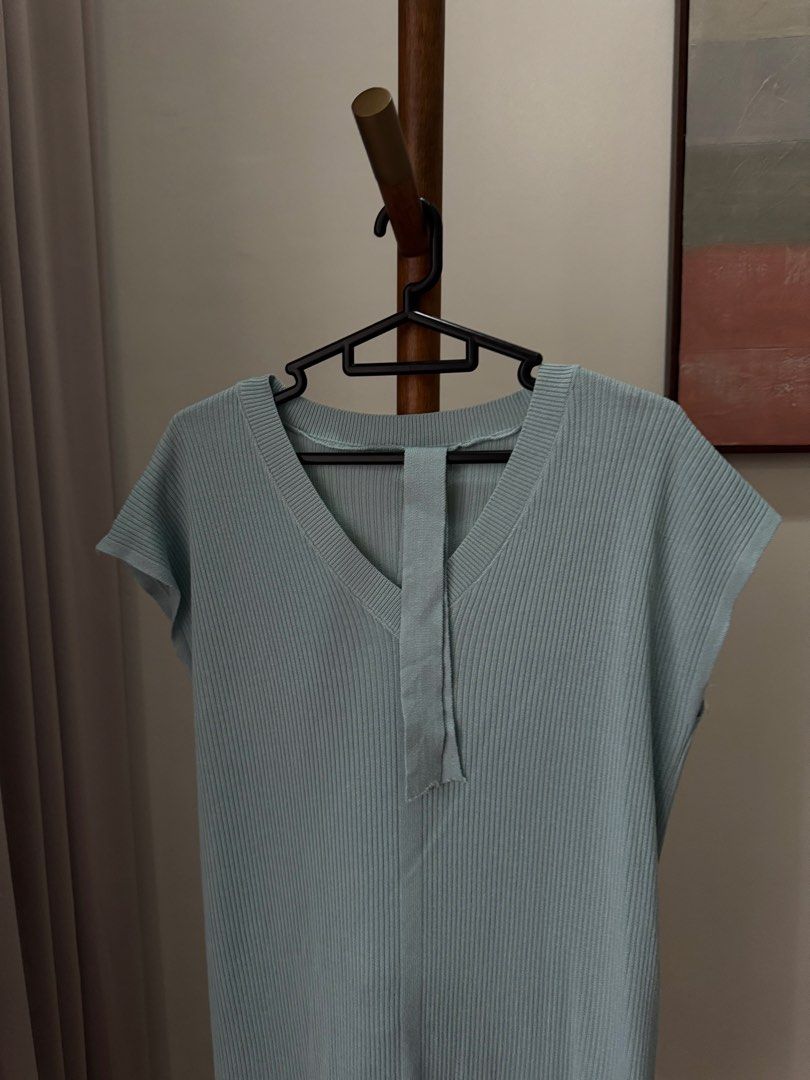 Light Blue Ribbed V-Neck Midi Dress (Category: Dresses) located in Pasig City. Submitted by kutleyn (Listing ID 1465760116, Image 2). Description: - Color: Light Blue - Material: Stretchy ribbed knit fabric for ultimate comfort - Design: V-neckline, short cap sleeves, and trendy side slits at the hem - Style: Casual midi dress, easy to throw on for everyday wear or running errands - Footwear pairing: Looks great with sneakers or flats.