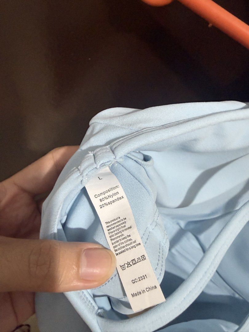 Light Blue Thin Strap Padded Yoga Tank Top (Category: Activewear) located in Caloocan City. Submitted by swnemma (Listing ID 1465863080, Image 3). Description: - Condition: used once. Like new - Color: Light blue - Size: Large - Material: 80% nylon, 20% spandex (soft & stretchy) - Features: Thin straps, racerback design, built-in padding - Best for: Workouts or daily casual wear, yoga, workout top, pickleball .