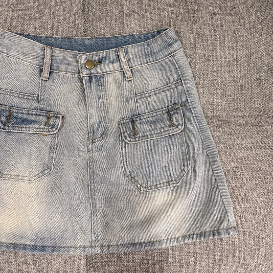 Light wash denim mini skirt with front pockets (Category: Skirts) located in Makati City. Submitted by jinlouise (Listing ID 1465845942, Image 1). Description: - Trendy light blue wash denim skirt - Flattering high-waist fit with belt loops and single button closure - Practical front utility cargo pockets and two classic back pockets - Durable, sturdy denim fabric with stylish slight fading at the hem - Perfect for casual everyday wear and easy t