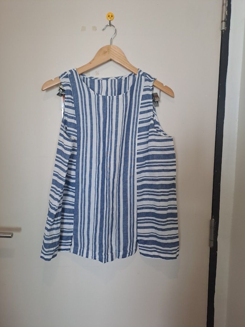 Linen sleeveless (Category: Sleeveless) located in Manila. Submitted by joanbalde39643 (Listing ID 1465862828, Image 1). Description: This is an Andrea Jovine Blue and White Striped Sleeveless Top. This boxy, relaxed-fit linen-cotton blend tank top features a multi-directional striped pattern with vertical stripes running down the center panel and horizontal stripes framing the sides..