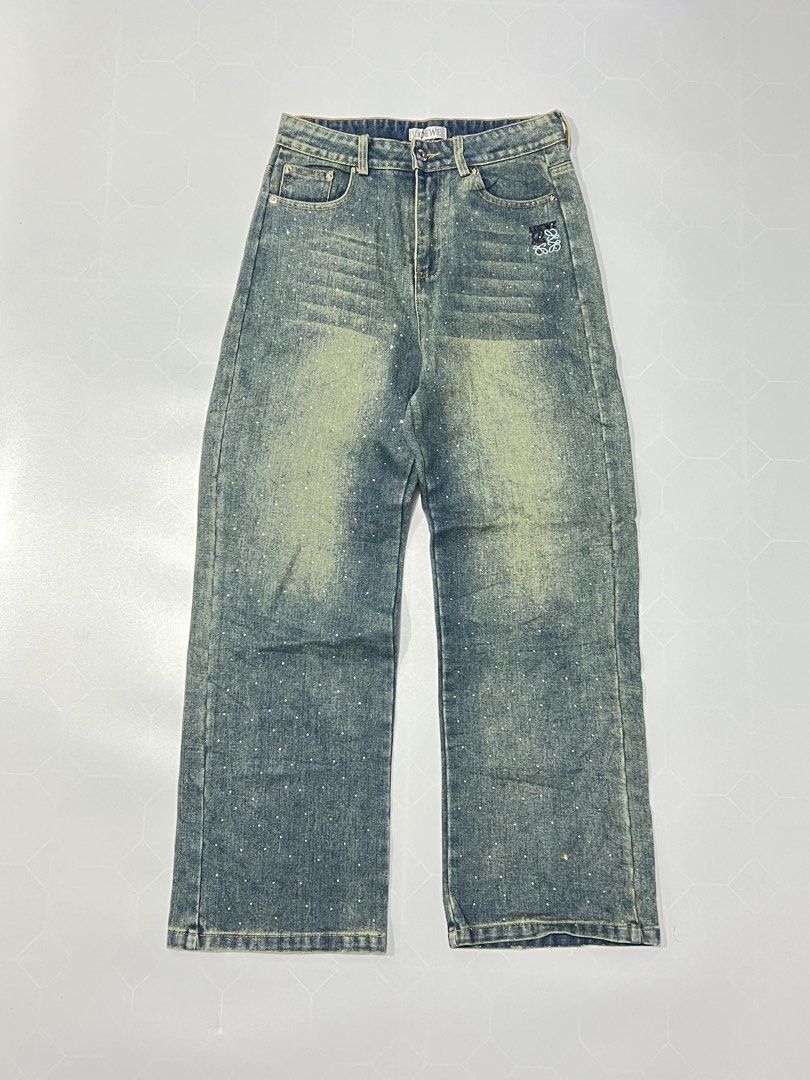 Loewe Rhinestone Distressed Denim Jeans (Category: Jeans) located in Caloocan City. Submitted by lostarchive_55 (Listing ID 1465914539, Image 2). Description: - Brand: Loewe - Style: Straight leg denim jeans - Wash: Faded and distressed - Details: All-over rhinestone embellishments with high sparkle - Condition: Brand new with paper hang tag attached - Features: Branded tag inside the waistband - Perfect statement piece for parties and trendy fit