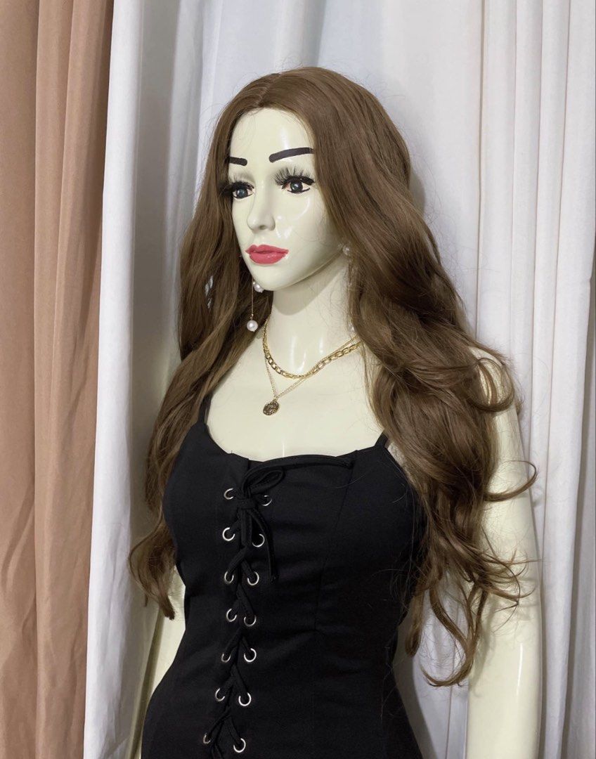 Long Brown Wavy Wig with Centre Part (Category: Hair Accessories) located in Dasmarinas. Submitted by legitbeauty08 (Listing ID 1465882670, Image 2). Description: - Style: Centre part with soft layers framing the face - Texture: Loose waves with natural-looking volume - Material: Easy-to-brush synthetic hair fibre - Length: Long - Use: Perfect for daily look or cosplay - Condition: Ready to wear.