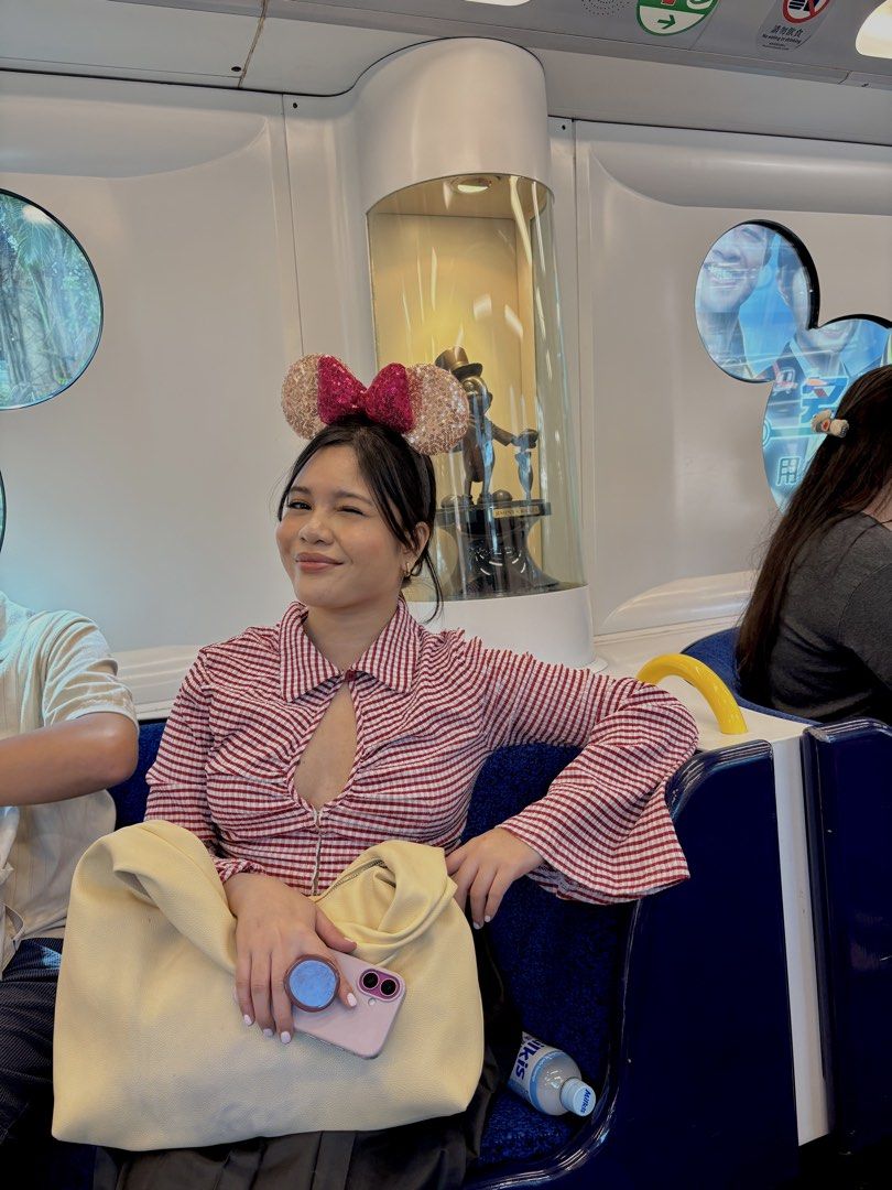 Long Sleeve Button Down Crop Top (Category: Blouses) located in Makati City. Submitted by dhenjiiie (Listing ID 1465860990, Image 3). Description: the item is wore once in disneyland, cannot wear anymore because the size is big. good as brand new, wore for like an hour for photo ops only.