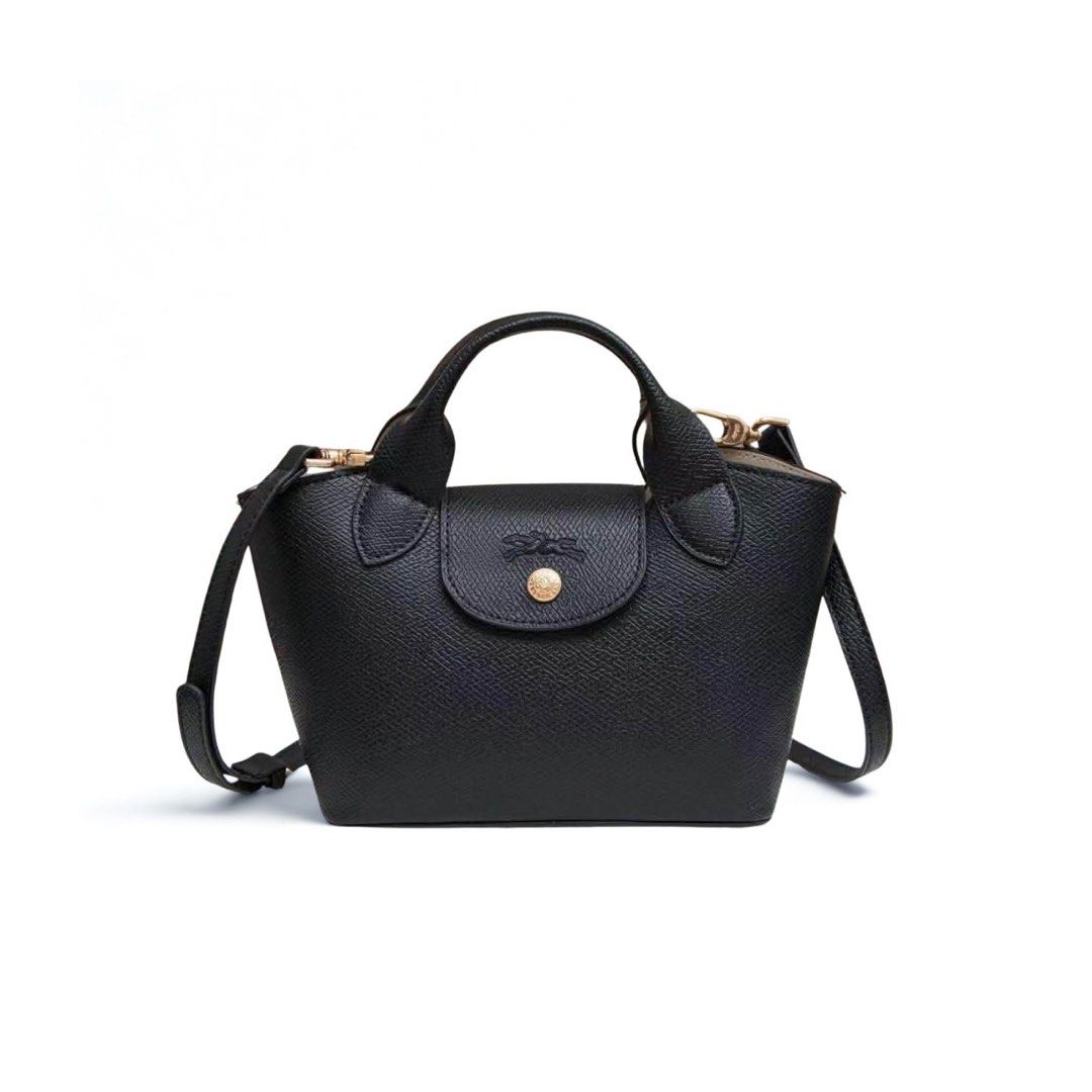 Longchamp Epure Black Small Sling Bag (Category: Luxury Bags & Wallets) located in Mandaluyong City. Submitted by bayline999 (Listing ID 1465775779, Image 1). Description: - Brand: Longchamp - Material: Textured cowhide grain leather in classic black - Hardware: Elegant gold-toned accents - Closure: Flap with signature horse logo snap button - Shape: Structured trapezoid daily carrier - Strap: Includes a removable shoulder strap for versatile sty