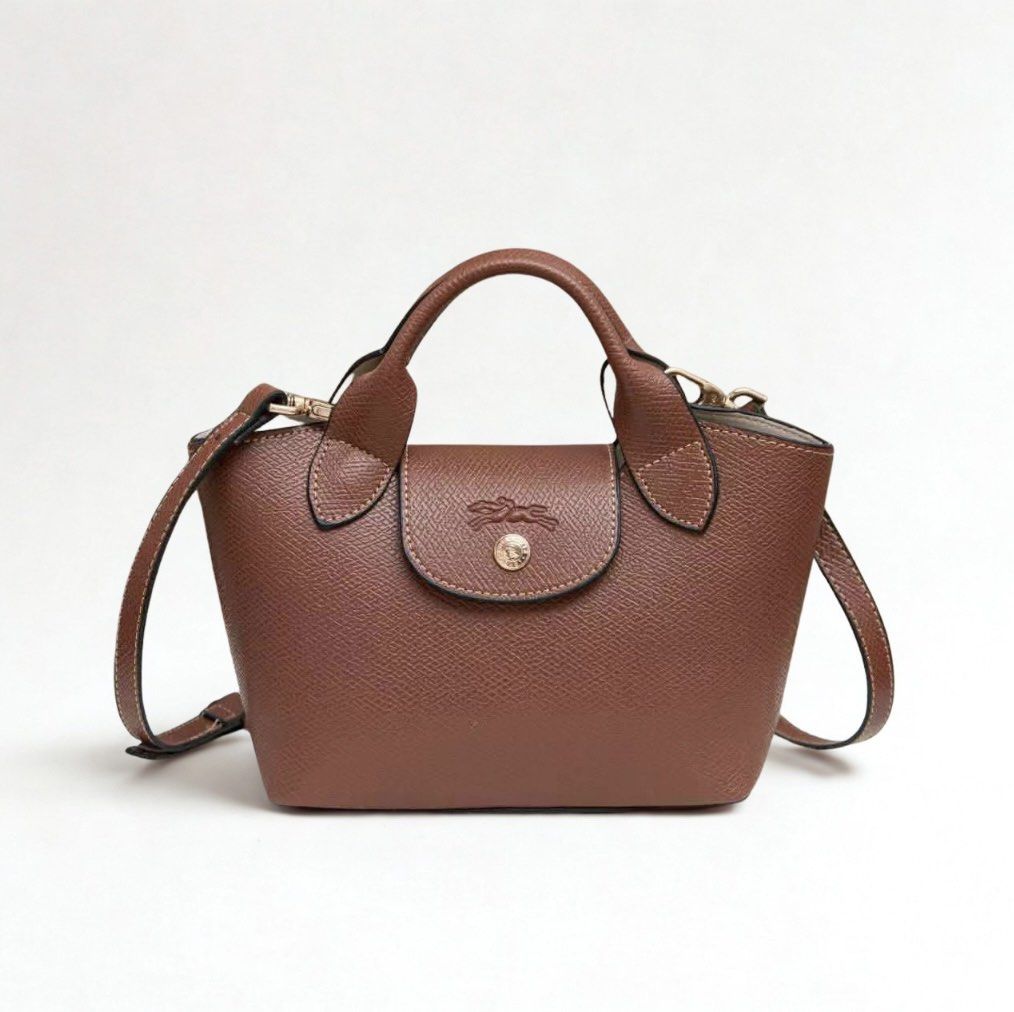 Longchamp Epure Brown Small Sling Bag (Category: Luxury Bags & Wallets) located in Mandaluyong City. Submitted by bayline999 (Listing ID 1465776662, Image 1). Description: .