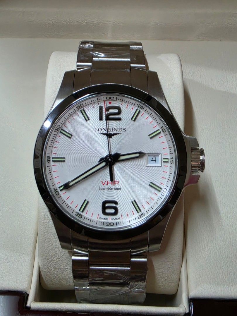 Longines Conquest V.H.P. Quartz Watch (Category: Luxury Watches) located in Marikina City. Submitted by thebmc (Listing ID 1465823250, Image 2). Description: Longines Conquest V.H.P. 41mm (Silver Dial with Black Ceramic Bezel) * Reference Number: L3.719.4.76.6 * Brand & Model: Longines Conquest V.H.P. (Very High Precision) * Case Diameter: 41 mm * Case Thickness: ~12 mm * Lug Width: 20 mm * Lug-to-Lug Distance: ~48 mm * Case Material: Stainless s