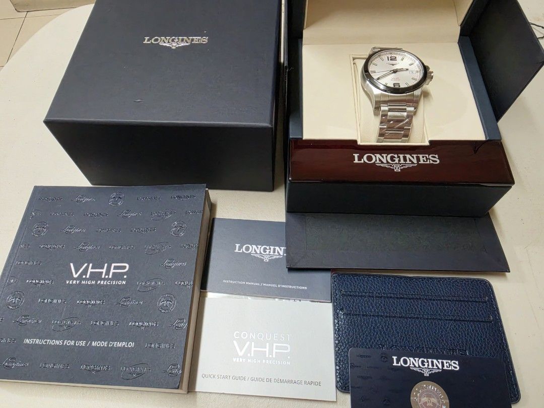 Longines Conquest V.H.P. Quartz Watch (Category: Luxury Watches) located in Marikina City. Submitted by thebmc (Listing ID 1465823250, Image 1). Description: Longines Conquest V.H.P. 41mm (Silver Dial with Black Ceramic Bezel) * Reference Number: L3.719.4.76.6 * Brand & Model: Longines Conquest V.H.P. (Very High Precision) * Case Diameter: 41 mm * Case Thickness: ~12 mm * Lug Width: 20 mm * Lug-to-Lug Distance: ~48 mm * Case Material: Stainless s