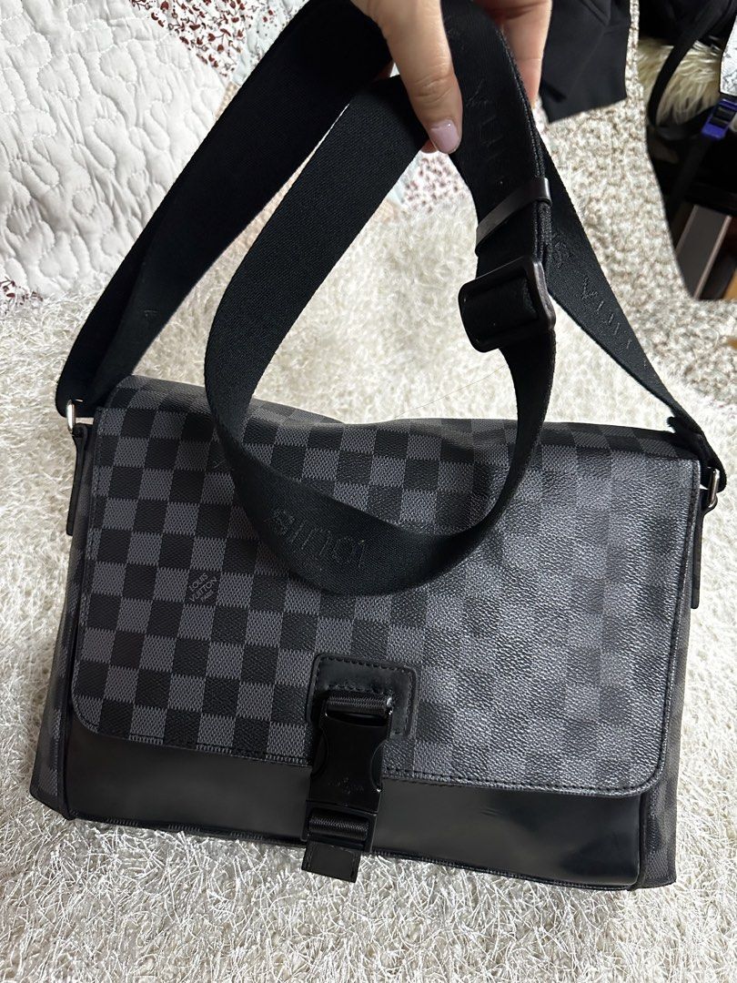Louis Vuitton Damier Graphite Messenger Bag (Category: Luxury Bags & Wallets) located in Manila. Submitted by aisasalvad24335 (Listing ID 1465802950, Image 2). Description: - Authentic Louis Vuitton messenger bag in iconic Damier Graphite canvas - Durable black leather trim along the bottom panel - Adjustable black strap featuring woven Louis Vuitton lettering - Secure plastic side-release buckle closure on the front flap - Spacious interior layo