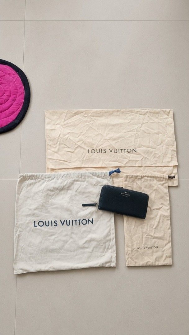 Louis Vuitton Dust Bags Bundle (Category: Wallets & Card holders) located in Cabadbaran. Submitted by lioness_cave (Listing ID 1465869553, Image 1). Description: - Black Kate Spade wallet with secure zip-around closure - Elegant gold-tone lettering on the front - Compact size fits easily into most everyday bags - Great for organizing cards and cash - Bonus: Includes 3 different-sized cream Louis Vuitton dust bags with navy blue branding.