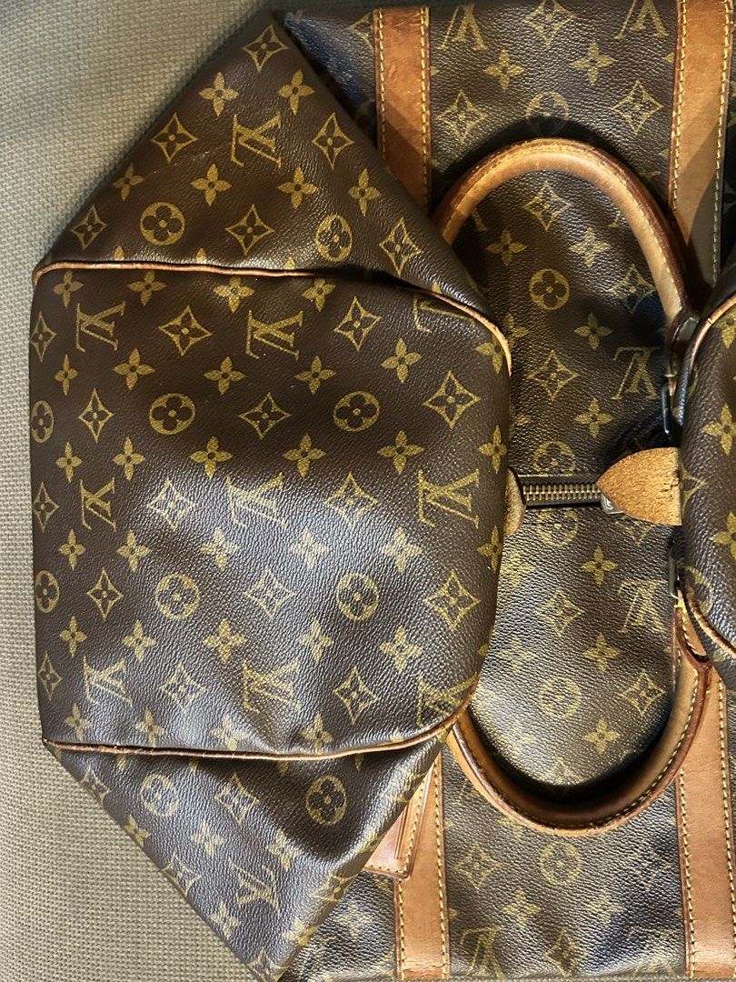 Louis Vuitton Keepall 50 (Category: Luxury Bags & Wallets) located in Quezon City. Submitted by glyndwr27 (Listing ID 1465874757, Image 3). Description: LV Vintage Keepall Condition: Exterior - 10/10 - Canvas still looks vibrant and very clean, leather trim also has developed a honey patina. Interior - 8/10 - Small Stain inside bag as seen in pictures. Inclusions: Comes with Dust Bag & Original Entrupy Certificate of Authenticity. 📍 Location: Va