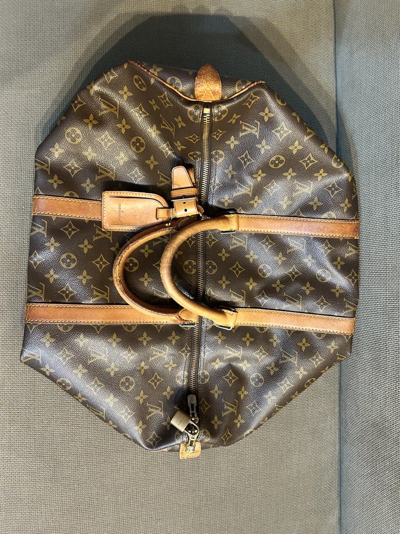 Louis Vuitton Keepall 50 (Category: Luxury Bags & Wallets) located in Quezon City. Submitted by glyndwr27 (Listing ID 1465874757, Image 1). Description: LV Vintage Keepall Condition: Exterior - 10/10 - Canvas still looks vibrant and very clean, leather trim also has developed a honey patina. Interior - 8/10 - Small Stain inside bag as seen in pictures. Inclusions: Comes with Dust Bag & Original Entrupy Certificate of Authenticity. 📍 Location: Va