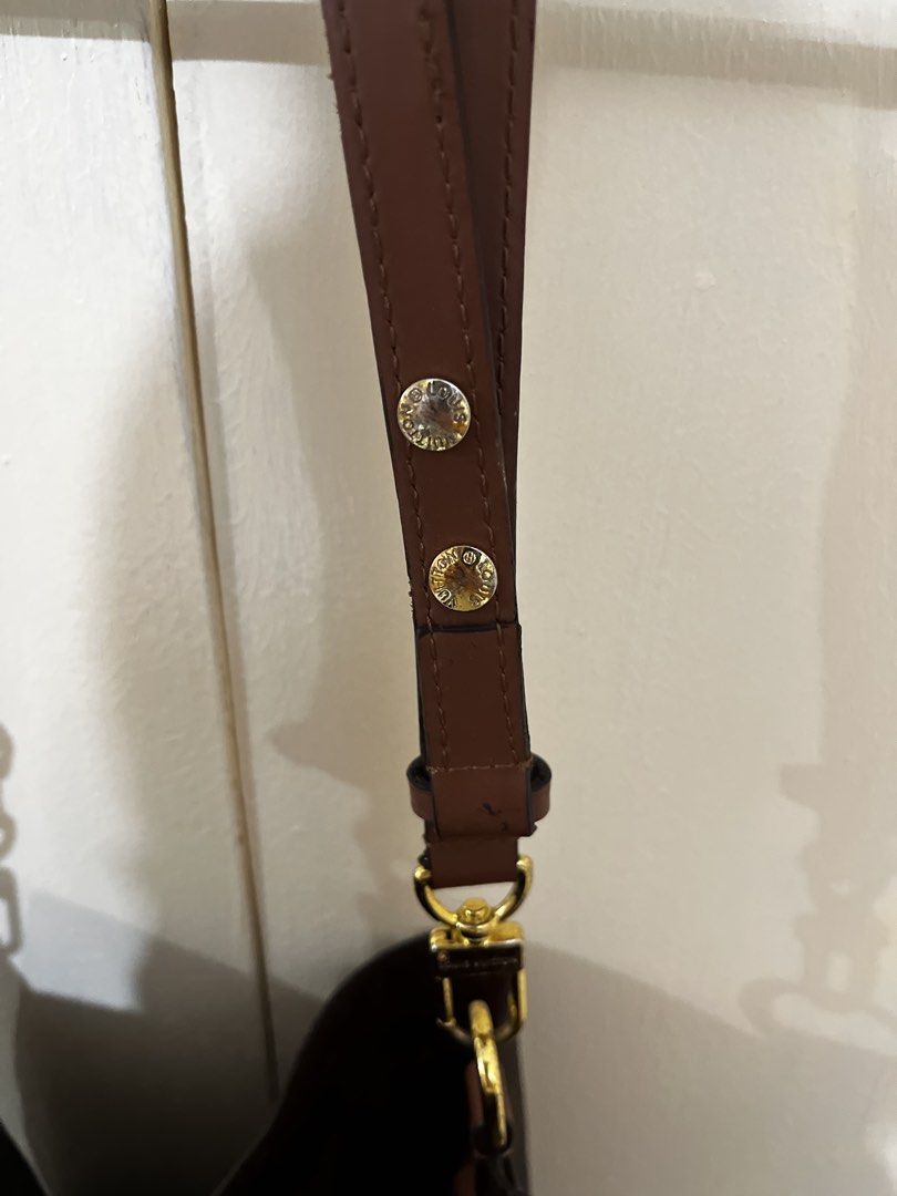 Louis Vuitton Monogram Bucket Bag (Category: Luxury Bags & Wallets) located in Paranaque City. Submitted by yakithings (Listing ID 1465896734, Image 2). Description: - Authentic Louis Vuitton Monogram bucket bag in classic brown canvas - Secure drawstring closure with comfortable brown leather shoulder straps - Gleaming gold-tone hardware - Spacious brown microfiber interior for daily essentials - Includes a matching removable zippered pouch (Mad