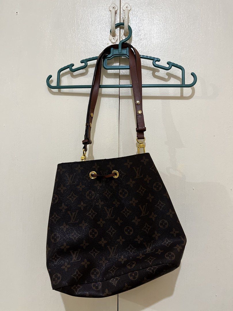 Louis Vuitton Monogram Bucket Bag (Category: Luxury Bags & Wallets) located in Paranaque City. Submitted by yakithings (Listing ID 1465896734, Image 1). Description: - Authentic Louis Vuitton Monogram bucket bag in classic brown canvas - Secure drawstring closure with comfortable brown leather shoulder straps - Gleaming gold-tone hardware - Spacious brown microfiber interior for daily essentials - Includes a matching removable zippered pouch (Mad