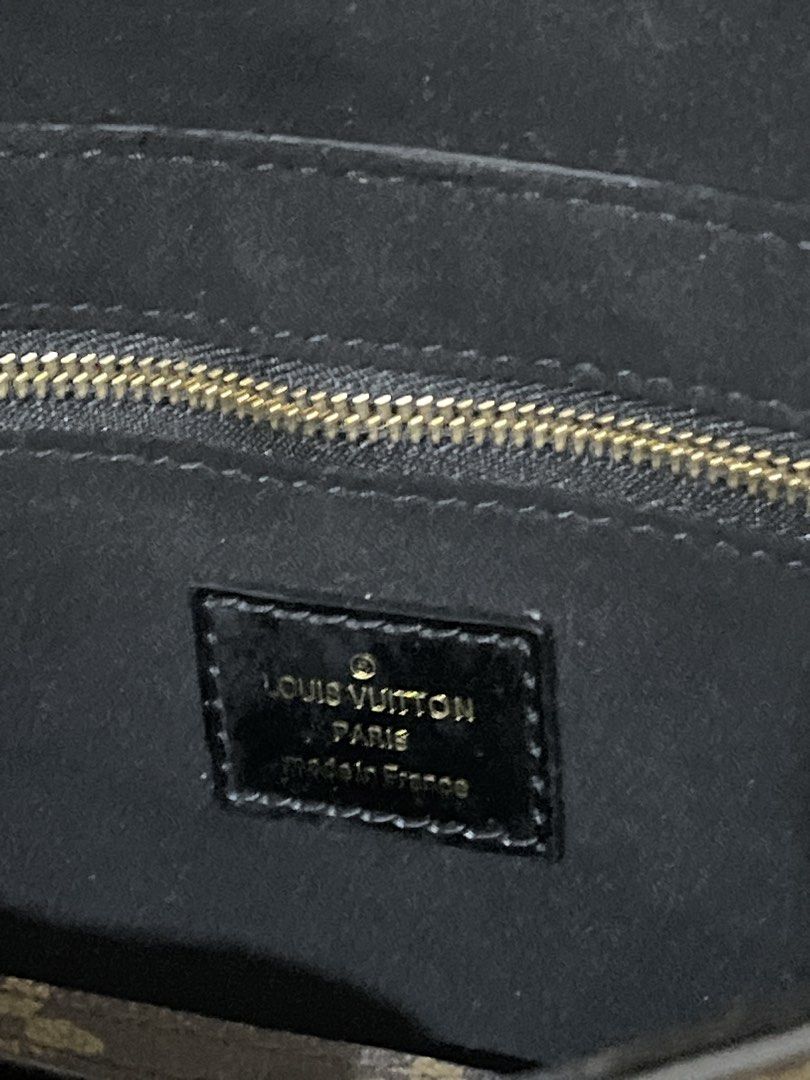 Louis Vuitton Monogram Canvas Handbag with Owl Charm (Category: Luxury Bags & Wallets) located in Paranaque City. Submitted by yakithings (Listing ID 1465896270, Image 3). Description: PAYMENT FIRST - Brand: Louis Vuitton (Made in France) - Material: Classic Monogram canvas with black leather flap and top handle - Hardware: Elegant gold-tone accents with a secure turn-lock closure - Exterior Detail: Adorable, removable playful owl charm near the 