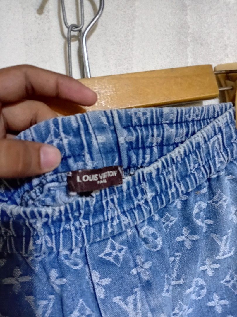 Louis Vuitton Monogram Denim Shorts Blue (Category: Shorts) located in Manila. Submitted by drip-from-thrift (Listing ID 1465953058, Image 3). Description: - Brand: Louis Vuitton - Color: Light blue with all-over monogram pattern - Material: Soft faded denim - Waistband: Elastic with adjustable drawstring for easy pull-on wear - Pockets: Deep functional pockets on both sides - Interior: Features official Louis Vuitton Paris brand tag - Style: Cas