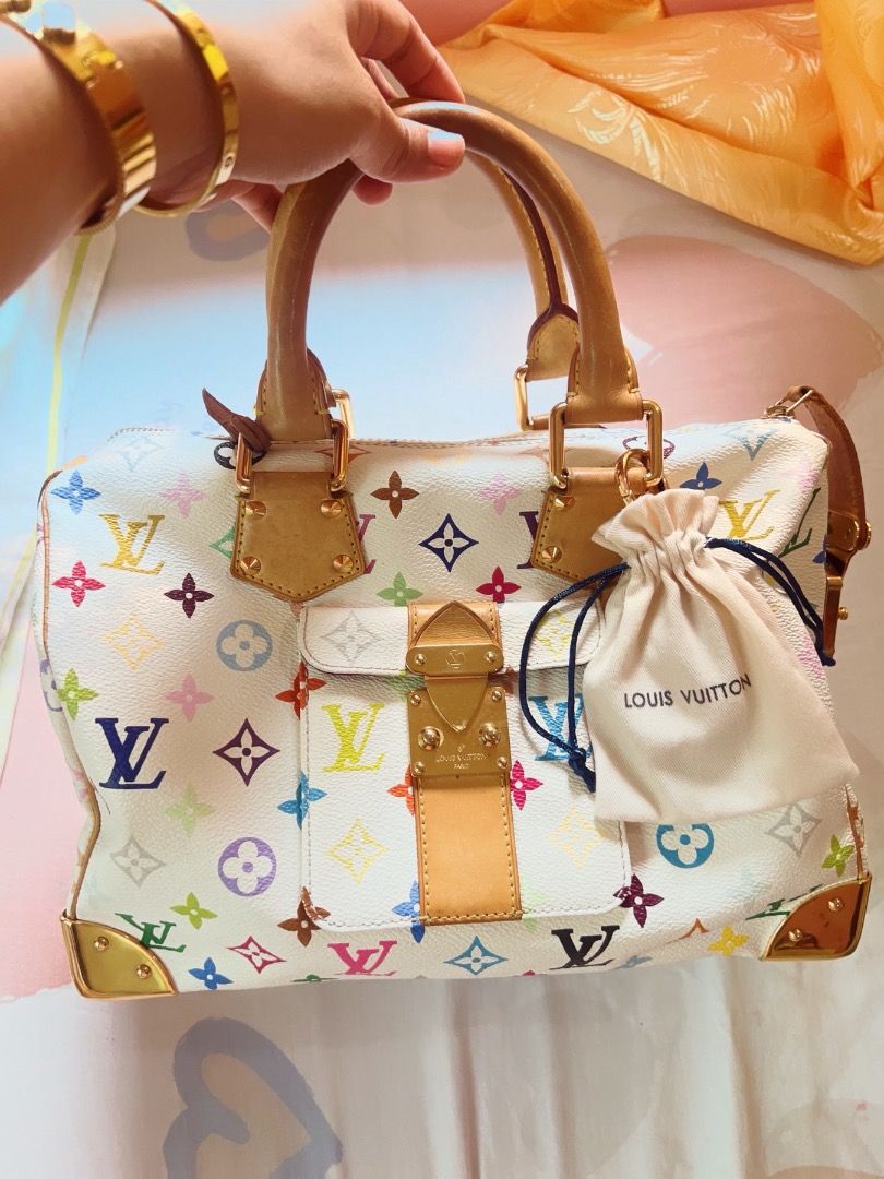 Louis Vuitton Multicolore White Speedy Handbag (Category: Luxury Bags & Wallets) located in Caloocan City. Submitted by sheriesung89940 (Listing ID 1465930503, Image 1). Description: - Authentic Louis Vuitton Monogram Multicolore Speedy bag in classic white - Features the iconic vibrant multicolour monogram print throughout - Crafted with Vachetta leather top handles, trim, and front pocket strap - Stunning gold-tone hardware including corner gua