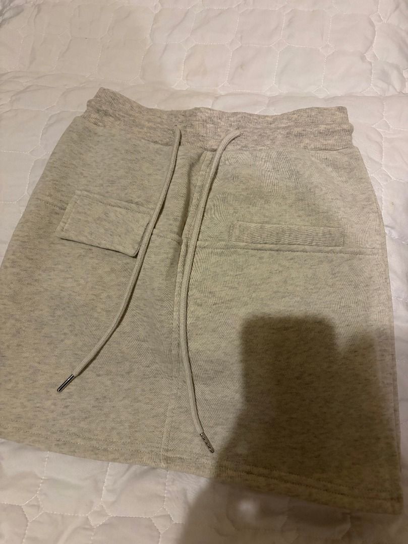 Lovito Grey Sweatshirt Skirt Size Bundle (Category: Skirts) located in Antipolo. Submitted by renz_1 (Listing ID 1465894712, Image 3). Description: Price: ₱300 (Bundle/Take Both) - Brand/Item: Lovito Grey Sweat Skirt - Size: XS to SMALL - Material: Super comfy fleece inside - Waistband: Elastic with adjustable drawstring and metal aglets - Details: Small cargo side pocket - Style: Great basic piece, easy to pair with tees or hoodies for casual we