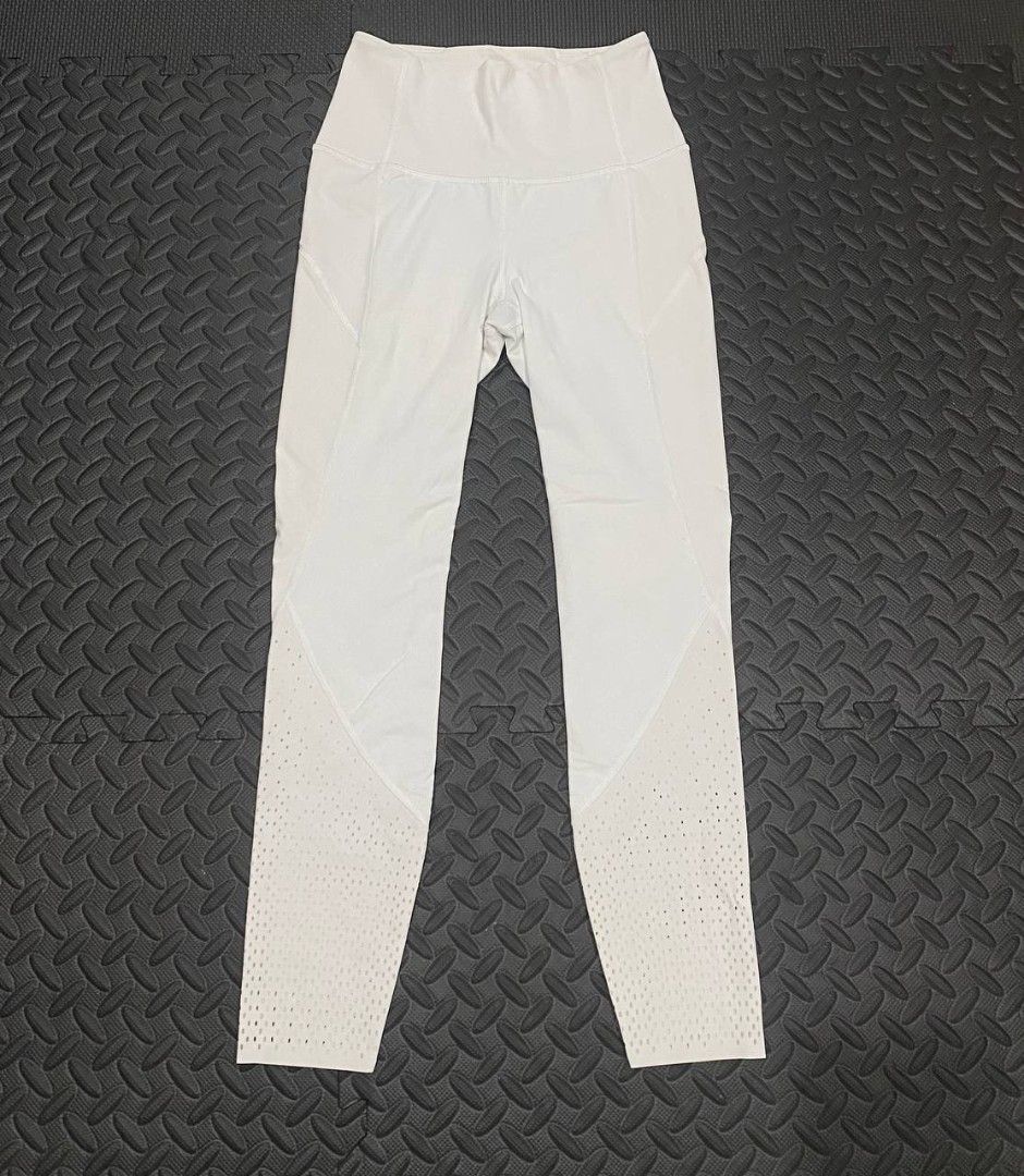 Lululemon ANEW Tight-white (Category: Activewear) located in Manila. Submitted by lovelypreloved1497 (Listing ID 1465903642, Image 2). Description: - Brand: Lululemon - Style: High-Rise Leggings with perforated calves - Color: Clean White - Size: 4 (interior circle tag) - Condition: Great, clean and ready to wear - Features: Breathable dotted pattern, supportive waistband, comfortable stretch fabric - Ideal for: Gym workouts, running, and casual 