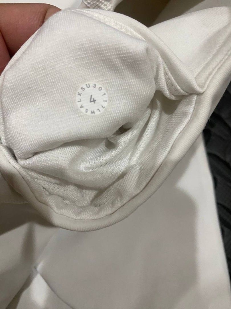 Lululemon ANEW Tight-white (Category: Activewear) located in Manila. Submitted by lovelypreloved1497 (Listing ID 1465903642, Image 3). Description: - Brand: Lululemon - Style: High-Rise Leggings with perforated calves - Color: Clean White - Size: 4 (interior circle tag) - Condition: Great, clean and ready to wear - Features: Breathable dotted pattern, supportive waistband, comfortable stretch fabric - Ideal for: Gym workouts, running, and casual 