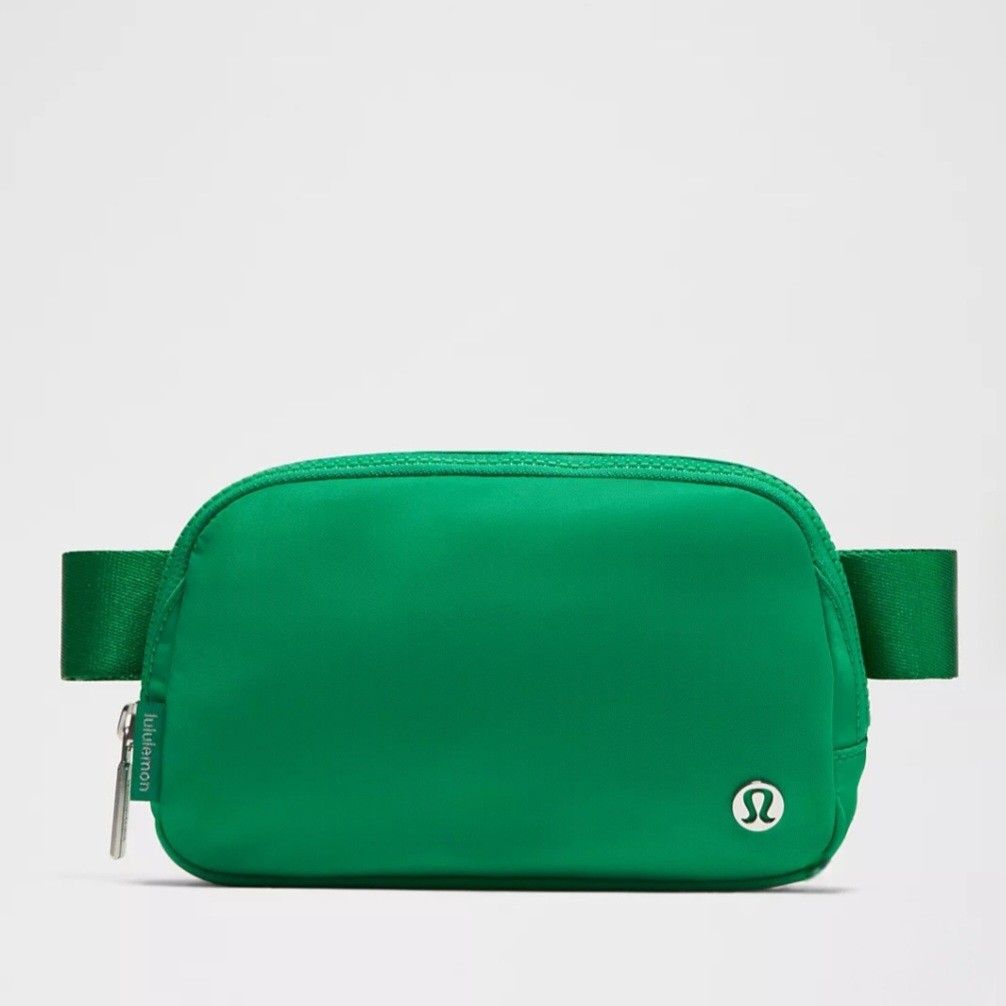 Lululemon Everywhere Belt Bag 1L Green (Category: Belt bags, Clutches and Pouches) located in Bulacan. Submitted by bnbig (Listing ID 1465926062, Image 1). Description: - Brand: Lululemon - Style: Everywhere Belt Bag - Capacity: 1 Litre - Color: Vibrant Green with matching strap - Hardware: Silver-toned - Condition: Brand new, still sealed in original plastic packaging with store tag attached - Features: Compact zippered pouch, signature logo emb