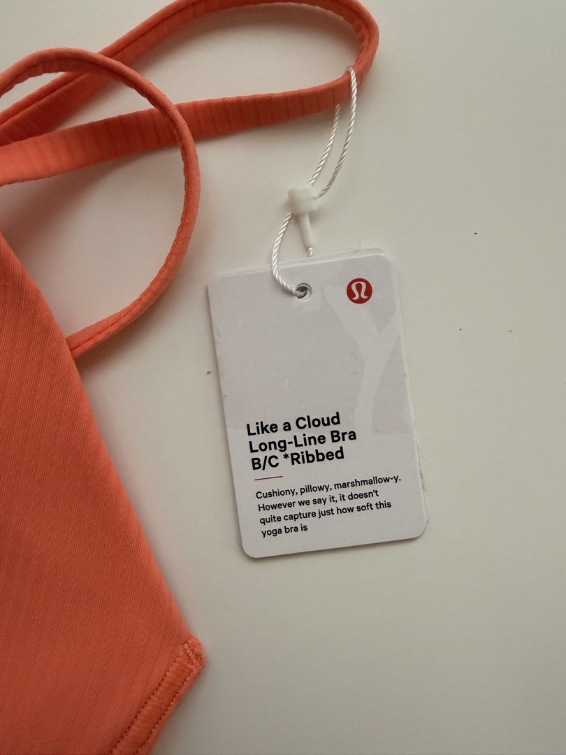Lululemon Like a Cloud Long-Line Bra B/C Ribbed (Category: Activewear) located in Muntinlupa City. Submitted by annepreloveditems (Listing ID 1465766409, Image 3). Description: - Brand: Lululemon - Style: Like a Cloud Long-Line Bra - Color: Ribbed coral pink - Size: 8 - Condition: Brand new with tags (BNWT) - Support: Light support with built-in B/C cups - Features: Super soft, stretchy fabric, longline cut, and stylish cross-over strappy back Bo