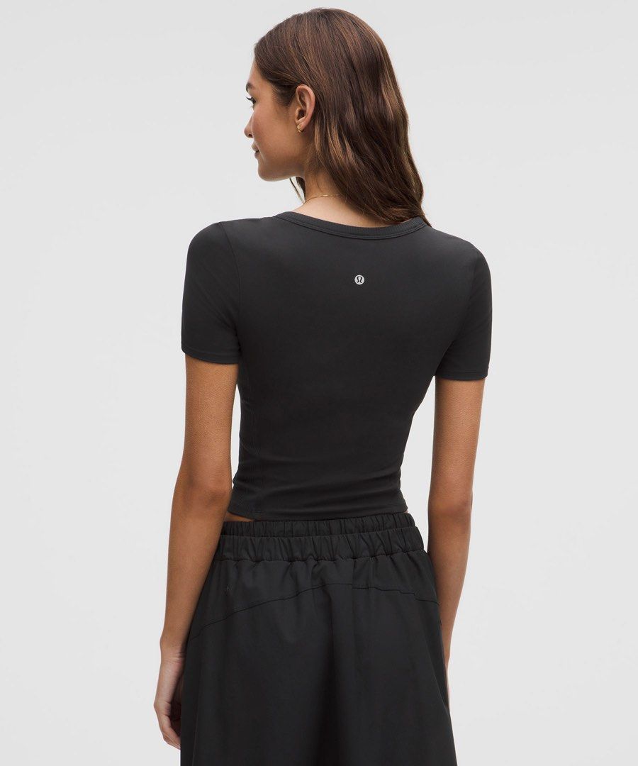 Lululemon Smooth and Ribbed Nulu square dot 4 (Category: Activewear) located in Iba. Submitted by xooperfindslb (Listing ID 1465896934, Image 3). Description: Smooth and Ribbed Nulu™ Women’s Sporty Low-Neck Short-Sleeve T-Shirt Square Dot 4 new release Preloved unused 2,280 each Black - available Warm umber gray - available With pad and padslot Can pass as new No issue .