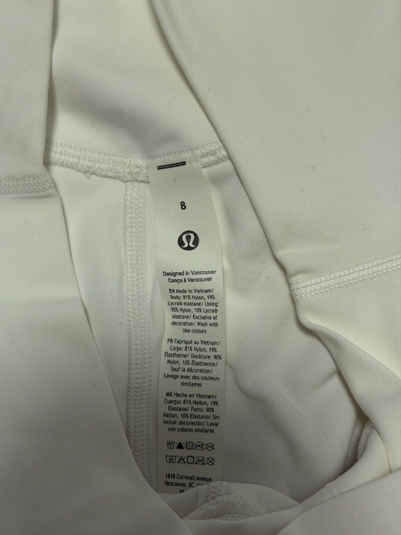 Lululemon White High-Rise Shorts Size 8 (Category: Shorts) located in Manila. Submitted by gongonpo (Listing ID 1465806165, Image 1). Description: - Brand: Lululemon - Item: Athletic Shorts - Size: 8 (Tag attached) - Color: White - Fit: High-rise - Material: Nylon and Lycra elastane blend - Details: Silver logo on back waistband - Condition: Brand new with tag - Best for: Workouts, yoga, or everyday casual wear - Size 8 - Not used.