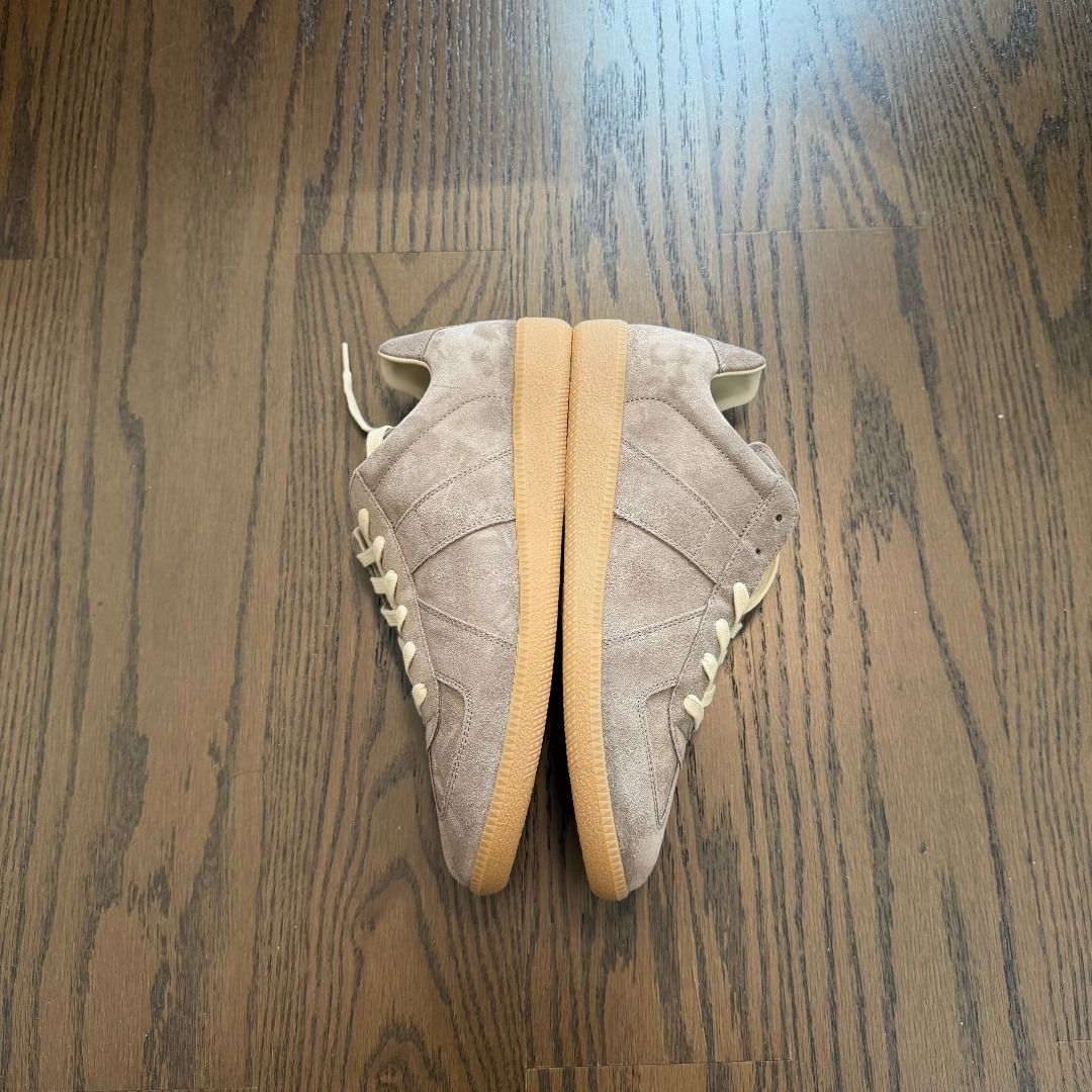 Maison Margiela gats(Taupe) (Category: Sneakers & Footwear) located in Makati City. Submitted by donda.archives (Listing ID 1465806756, Image 2). Description: Size 40-47. Batch with fully built-in NFC chip. The entire upper uses premium top-layer cow suede with a high-sheen finish. Imported INCAS leather used. The leather has a nice matte finish, and the overall shoe shape is solid with no issues. The overall leather color is consistent. Everythi