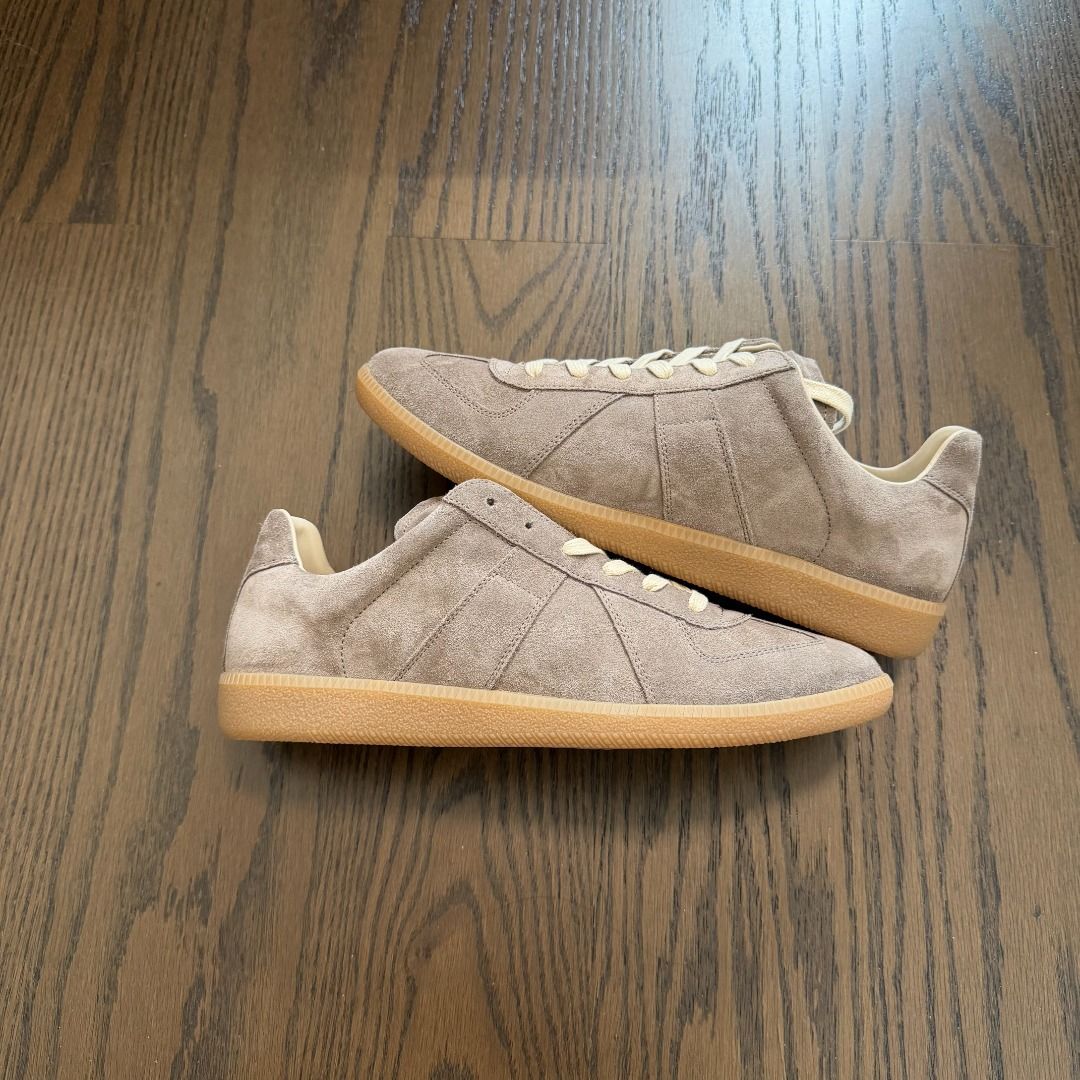 Maison Margiela gats(Taupe) (Category: Sneakers & Footwear) located in Makati City. Submitted by donda.archives (Listing ID 1465806756, Image 1). Description: Size 40-47. Batch with fully built-in NFC chip. The entire upper uses premium top-layer cow suede with a high-sheen finish. Imported INCAS leather used. The leather has a nice matte finish, and the overall shoe shape is solid with no issues. The overall leather color is consistent. Everythi