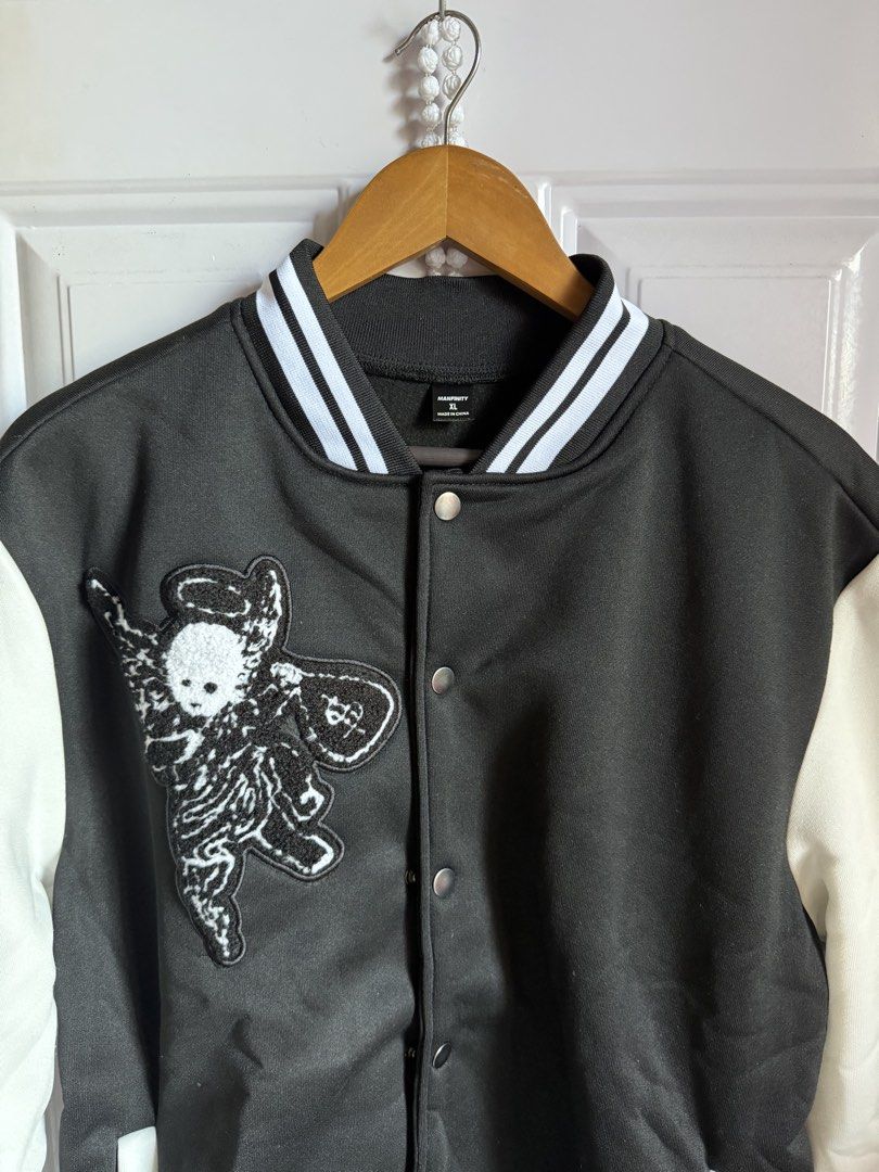 MANFINITY Hustle Daily Patched Varsity Jacket (Category: Coats, Jackets and Outerwear) located in Las Pinas. Submitted by sellerkjb (Listing ID 1465950496, Image 3). Description: BRAND NEW XL — 24 x 29 inches LAS PINAS.