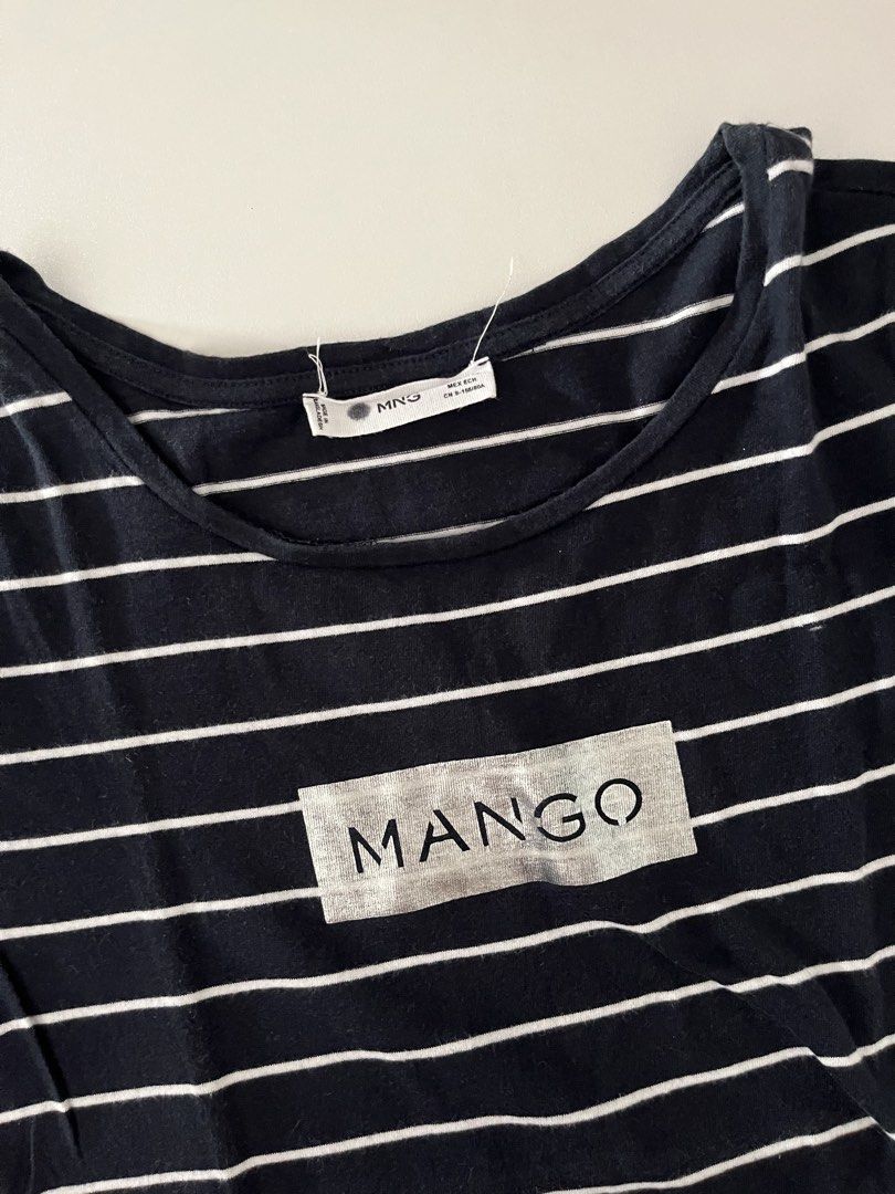 MANGO Blue and White Striped T-shirt (Category: Shirts) located in Cavite. Submitted by ysieunz (Listing ID 1465832636, Image 2). Description: size: xs-small color: navy blue with white stripes disclaimer: all clothes are preloved but still in good-as-new condition and were only used 1–2 times. the color may vary due to lighting, but all details will be stated in the description. 📍 General Trias, Cavite 💰 GCash/Maya 🚚 JNT/SDD/Meet Up.