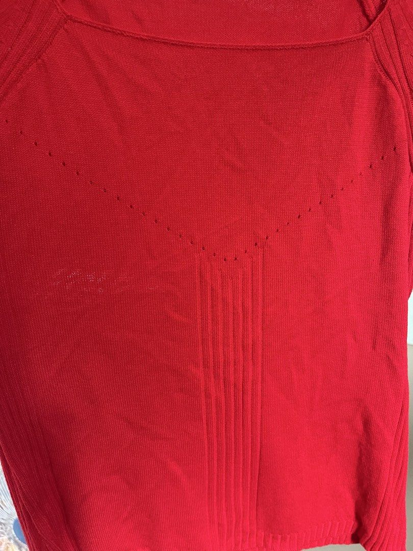 Marie Claire Paris Red Knit Top (Category: Blouses) located in Baybay. Submitted by shikita27906 (Listing ID 1465849314, Image 3). Description: - Brand: Marie Claire Paris - Color: Bright red - Neckline: Square neck with short sleeves - Design: Pointelle stitch V-shape pattern across the chest - Texture: Ribbed details on shoulders, sides, and front center - Fit: Soft, comfortable knit fabric.