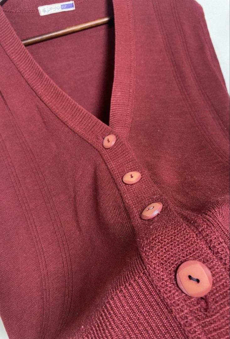 Maroon button down vest (Category: Others Tops) located in Makati City. Submitted by indaysukaycloset (Listing ID 1465871257, Image 2). Description: MAROON BUTTON-DOWN VEST Brand: Japan Brand (Ootole - Japanese tag) Size: Freesize - Fits M-L Color: Maroon / Burgundy / Wine Red Details: - W-20 L-22 (laid flat, in inches) - V-neck button-front vest - sleeveless cardigan style - 4 buttons in front - peach / light orange buttons (cute contrast) - Fin