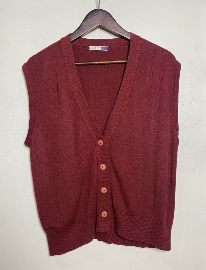Maroon button down vest (Category: Others Tops) located in Makati City. Submitted by indaysukaycloset (Listing ID 1465871257, Image 1). Description: MAROON BUTTON-DOWN VEST Brand: Japan Brand (Ootole - Japanese tag) Size: Freesize - Fits M-L Color: Maroon / Burgundy / Wine Red Details: - W-20 L-22 (laid flat, in inches) - V-neck button-front vest - sleeveless cardigan style - 4 buttons in front - peach / light orange buttons (cute contrast) - Fin