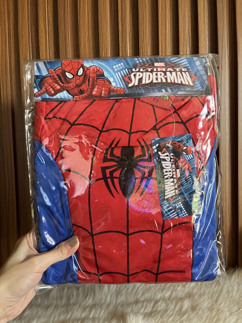 Marvel Ultimate Spider-Man Costume Size T3 (Category: Babies & Kids Fashion) located in Navotas City. Submitted by mommybabyc (Listing ID 1465874829, Image 1). Description: Marvel Ultimate Spider-Man costume set. Includes full body suit, mask, and gloves. Red and blue design with black spider logo on the chest. Still in original plastic packaging with hanger and tags attached. Win-Ol Business Ventures, Philippines manufacture. Size T3 marked on t