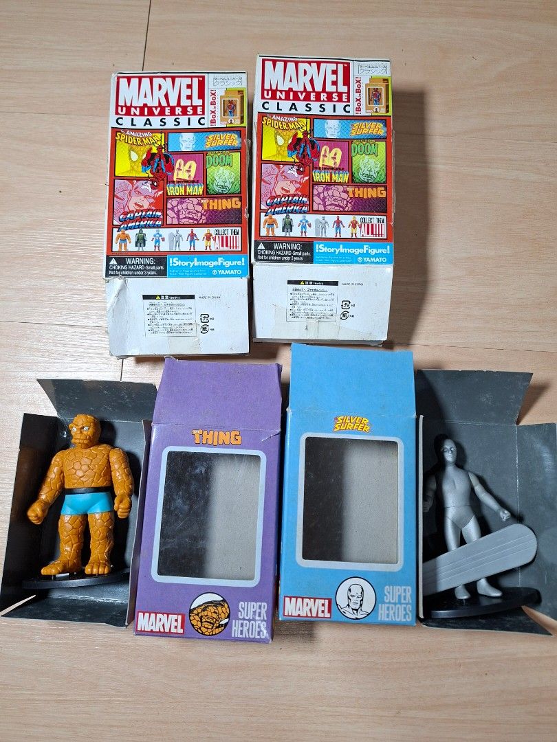 Marvel Universe Classic Box in Box Figures Silver Surfer Thing (Category: Figurines & Statues) located in Baguio. Submitted by restyrille77846 (Listing ID 1465886854, Image 1). Description: - Authentic Yamato Marvel Universe Classic figures - Includes Silver Surfer with surfboard (blue box) - Includes The Thing (purple box) - Comes with original packaging for both figures - Includes two additional outer display boxes as seen in photos - Great add
