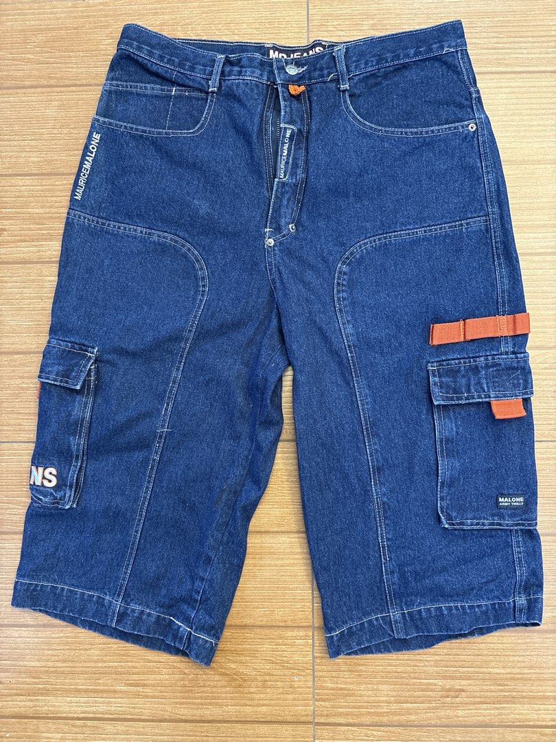 Maurice Malone Denim Cargo Shorts Blue Orange (Category: Shorts) located in Manila. Submitted by json2k (Listing ID 1465774232, Image 1). Description: RFS : decluttering! Strictly no refunds! - Brand: Maurice Malone - Style: Vintage streetwear denim cargo shorts - Color: Dark blue wash with orange contrast detailing - Pockets: Multiple heavy-duty utility cargo pockets on both legs - Fit: Relaxed fit with panel stitching - Details: Tagged branding