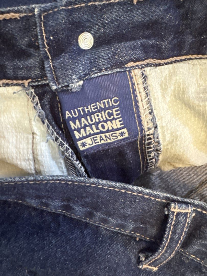 Maurice Malone Denim Cargo Shorts Blue Orange (Category: Shorts) located in Manila. Submitted by json2k (Listing ID 1465774232, Image 3). Description: RFS : decluttering! Strictly no refunds! - Brand: Maurice Malone - Style: Vintage streetwear denim cargo shorts - Color: Dark blue wash with orange contrast detailing - Pockets: Multiple heavy-duty utility cargo pockets on both legs - Fit: Relaxed fit with panel stitching - Details: Tagged branding