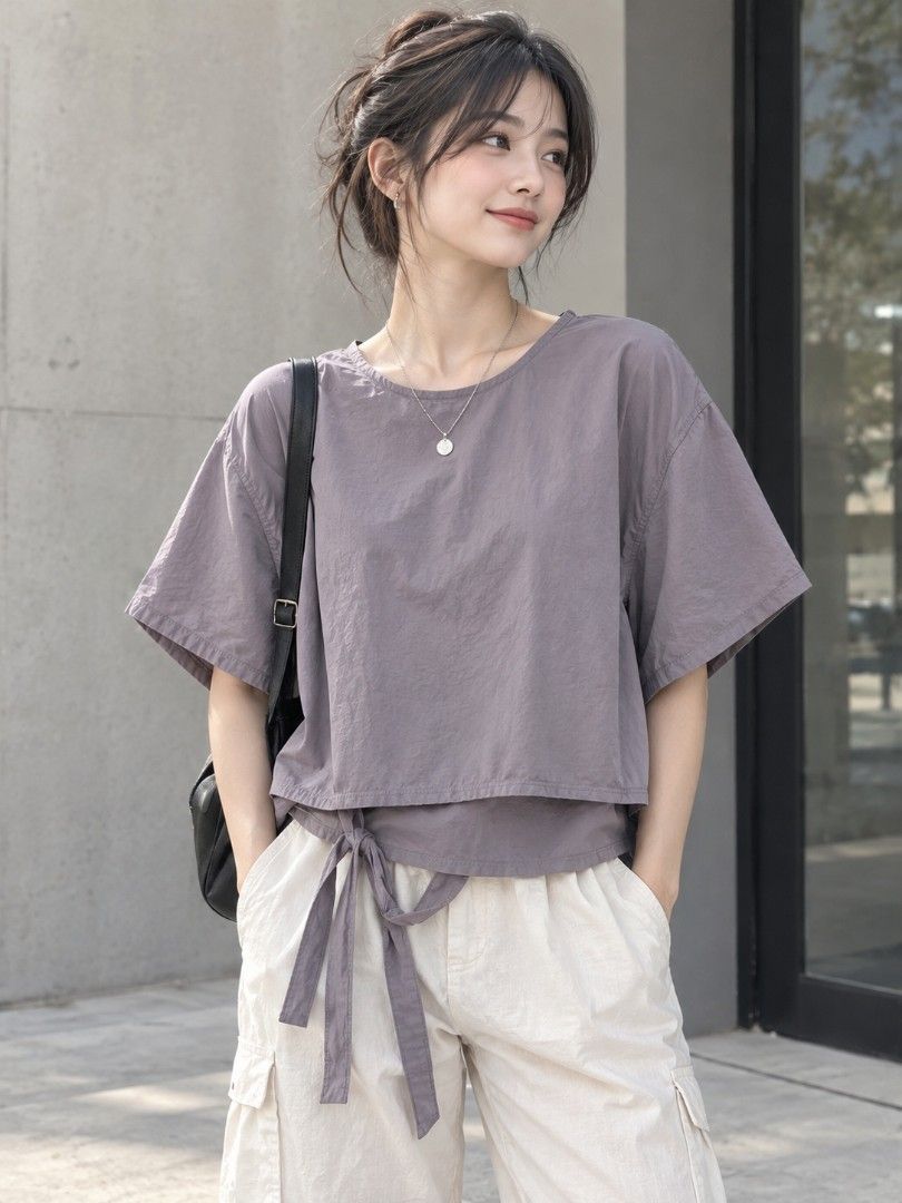 Mauve with Overlapping Back Detail Blouse (Category: Blouses) located in Mexico. Submitted by silverkatie429 (Listing ID 1465949577, Image 1). Description: This mauve short-sleeve blouse features a relaxed fit with a chic back overlapping back and waist-tie detail for added shape. Its soft fabric and versatile design make it perfect for casual days or dressed-up layering.