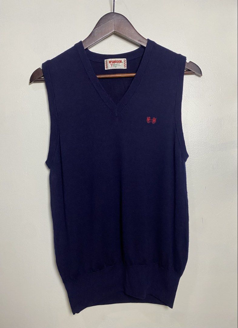 Mcgregor navy v-neck vest (Category: Others Tops) located in Makati City. Submitted by indaysukaycloset (Listing ID 1465869782, Image 1). Description: McGREGOR NAVY V-NECK VEST Brand: McGREGOR Happy American (Japan) Size: M on tag - Fits S-M Color: Navy Blue Details: - W-17 L-24 (laid flat, in inches) - V-neck sleeveless knit vest - Iconic small red embroidered logo (dual dragons) on left chest - Thick ribbed hem, soft fine knit - Material: NEW W