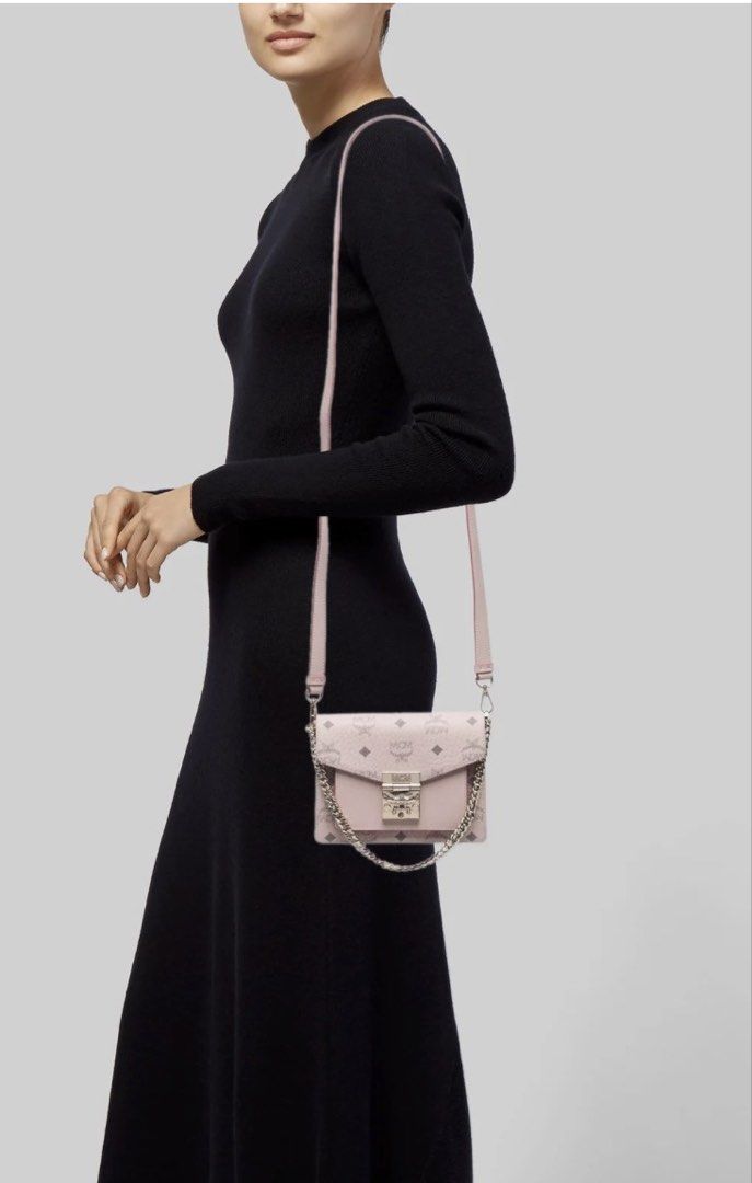 MCM Pink Bag (Category: Cross-body Bags) located in Las Pinas. Submitted by pachdeclutters (Listing ID 1465838335, Image 2). Description: BRAND NEW MCM Visetos Patricia Mini 🏷️20K Pesos Negotiable (Got it for 532 dollars plus tax) - Comes with OG Dustbag - Two-Way Bag since long strap is removable😊 - Guaranteed Authentic as personally bought it in store RFS: Decluttering.