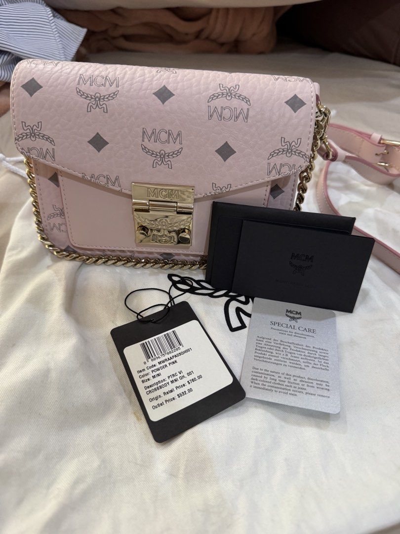 MCM Pink Bag (Category: Cross-body Bags) located in Las Pinas. Submitted by pachdeclutters (Listing ID 1465838335, Image 1). Description: BRAND NEW MCM Visetos Patricia Mini 🏷️20K Pesos Negotiable (Got it for 532 dollars plus tax) - Comes with OG Dustbag - Two-Way Bag since long strap is removable😊 - Guaranteed Authentic as personally bought it in store RFS: Decluttering.