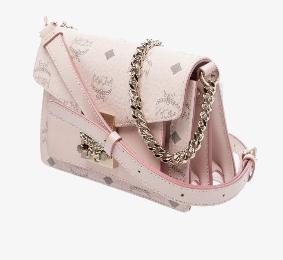 MCM Pink Bag (Category: Cross-body Bags) located in Las Pinas. Submitted by pachdeclutters (Listing ID 1465838335, Image 3). Description: BRAND NEW MCM Visetos Patricia Mini 🏷️20K Pesos Negotiable (Got it for 532 dollars plus tax) - Comes with OG Dustbag - Two-Way Bag since long strap is removable😊 - Guaranteed Authentic as personally bought it in store RFS: Decluttering.