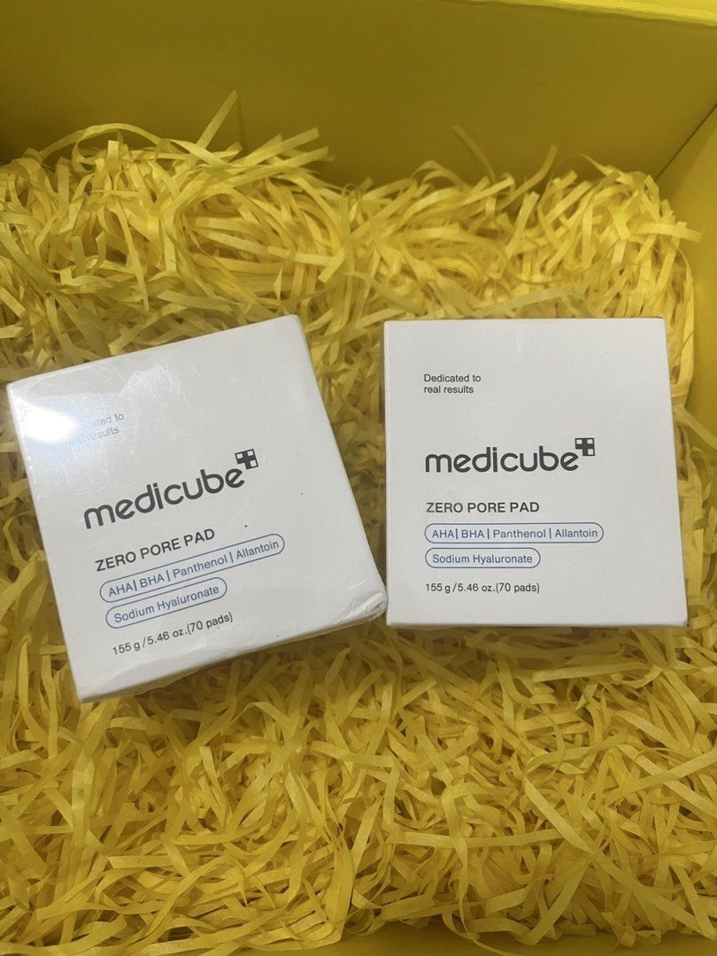 Medicube Zero Pore Pad 155g (Category: Face Care) located in Makati City. Submitted by pgandaco (Listing ID 1465929348, Image 1). Description: - Product: Medicube Zero Pore Pad - Quantity: 70 pads per box (155g) - Condition: Brand new, unopened packaging - Key Ingredients: AHA, BHA, Panthenol, Allantoin, Sodium Hyaluronate - Packaging: Securely packed with yellow crinkle paper filling - Perfect for gentle exfoliation and pore care.