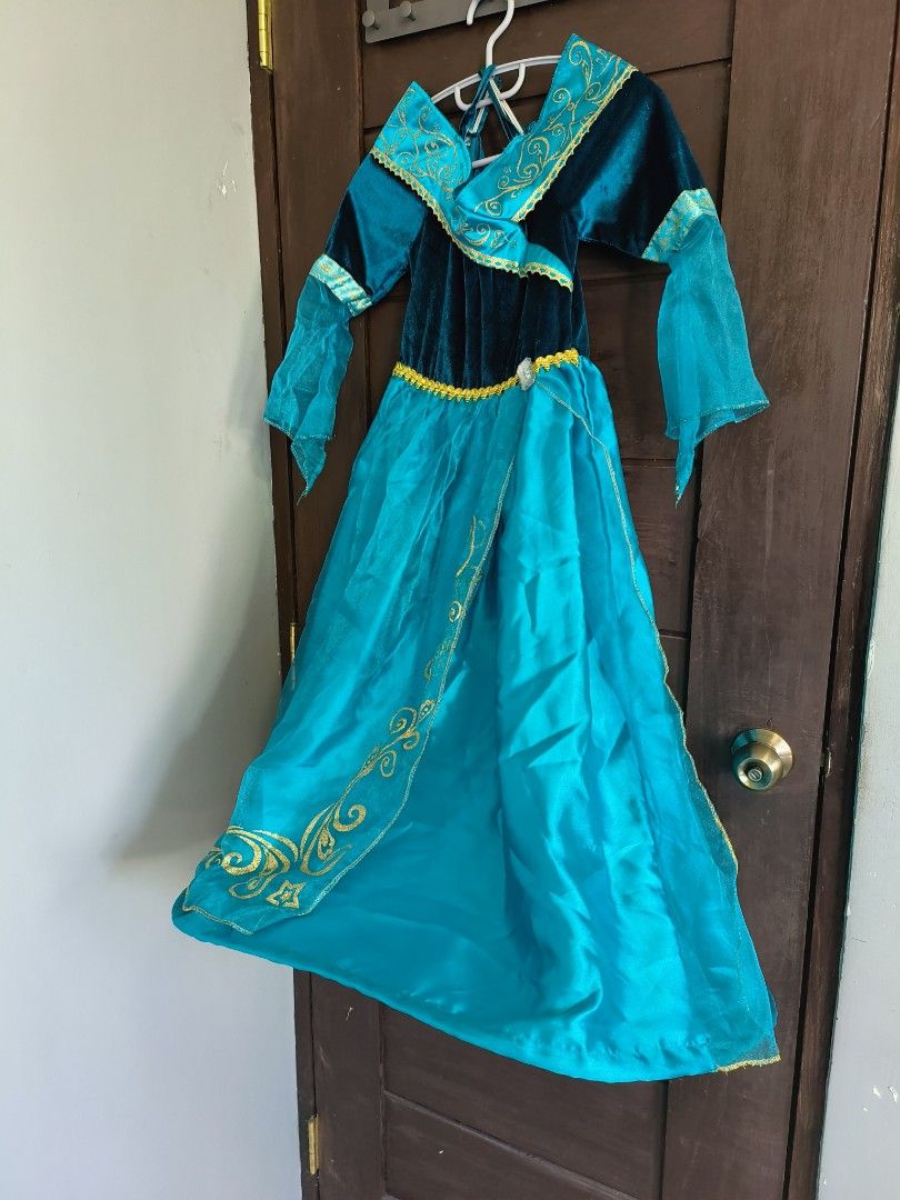 Medieval Princess Costume (Category: Babies & Kids Fashion) located in Pasay City. Submitted by pearldc (Listing ID 1465767884, Image 2). Description: - turquoise and dark blue princess dress - with gold glitter scroll patterns on the collar, sleeves, and hem - Sheer long sleeves - Never worn, in storage due to the pandemic - Ideal for dress-up, birthday parties, and themed events - tag indicates 10-11 .