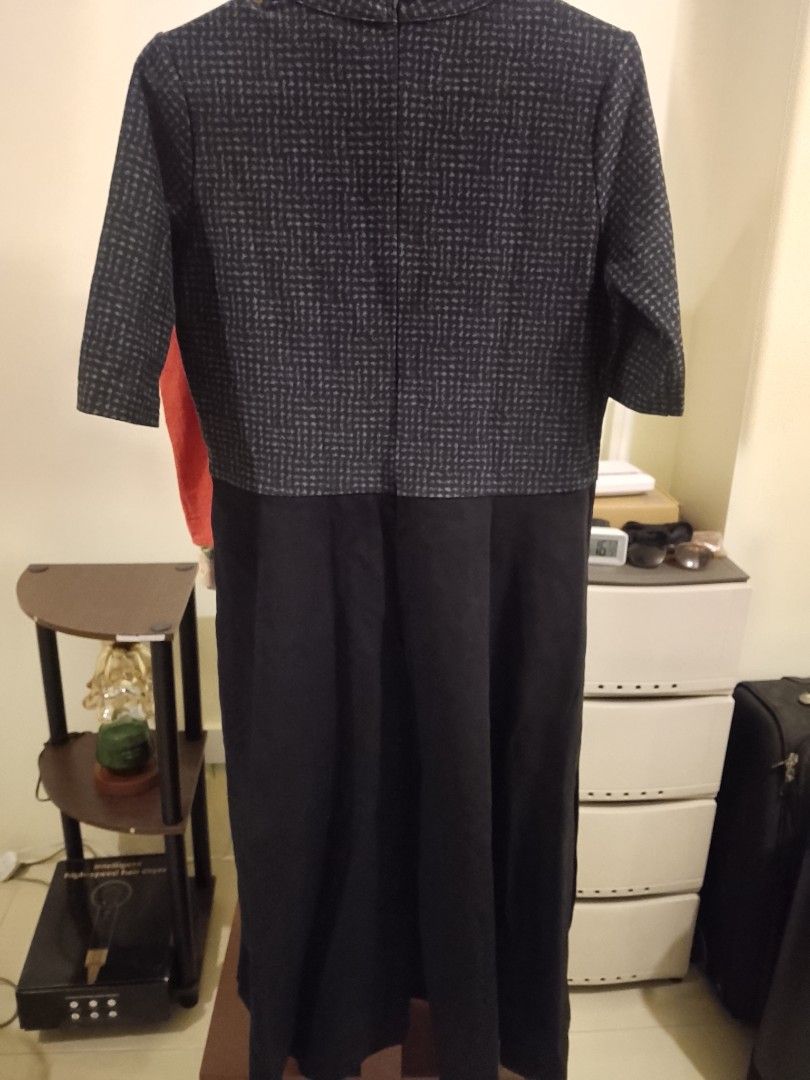 Meg dark grey houndstooth pattern midi dress size M (Category: Dresses) located in Quezon City. Submitted by macieee39997 (Listing ID 1465867781, Image 2). Description: - Brand: Meg - Size: M (tag on collar) - Color/Pattern: Dark grey with houndstooth patterned top and solid black skirt - Style: Midi dress with half sleeves and high neckline. A-style skirt - Closure: Back zipper - Condition: Clean fabric, well cared for.